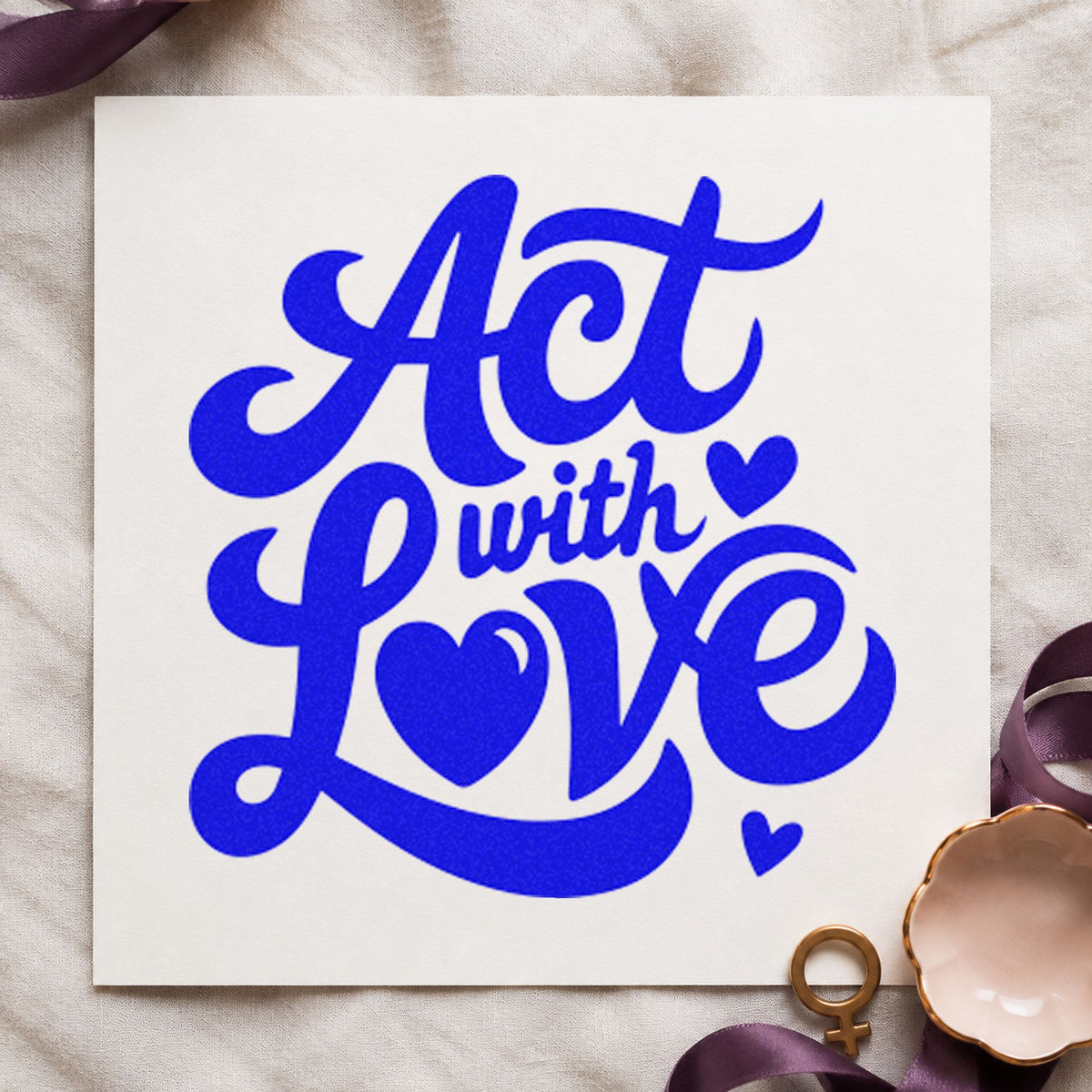 Act With Love Hearts craft stamp in blue ink on cardstock, an easy option for carry cloth printing.