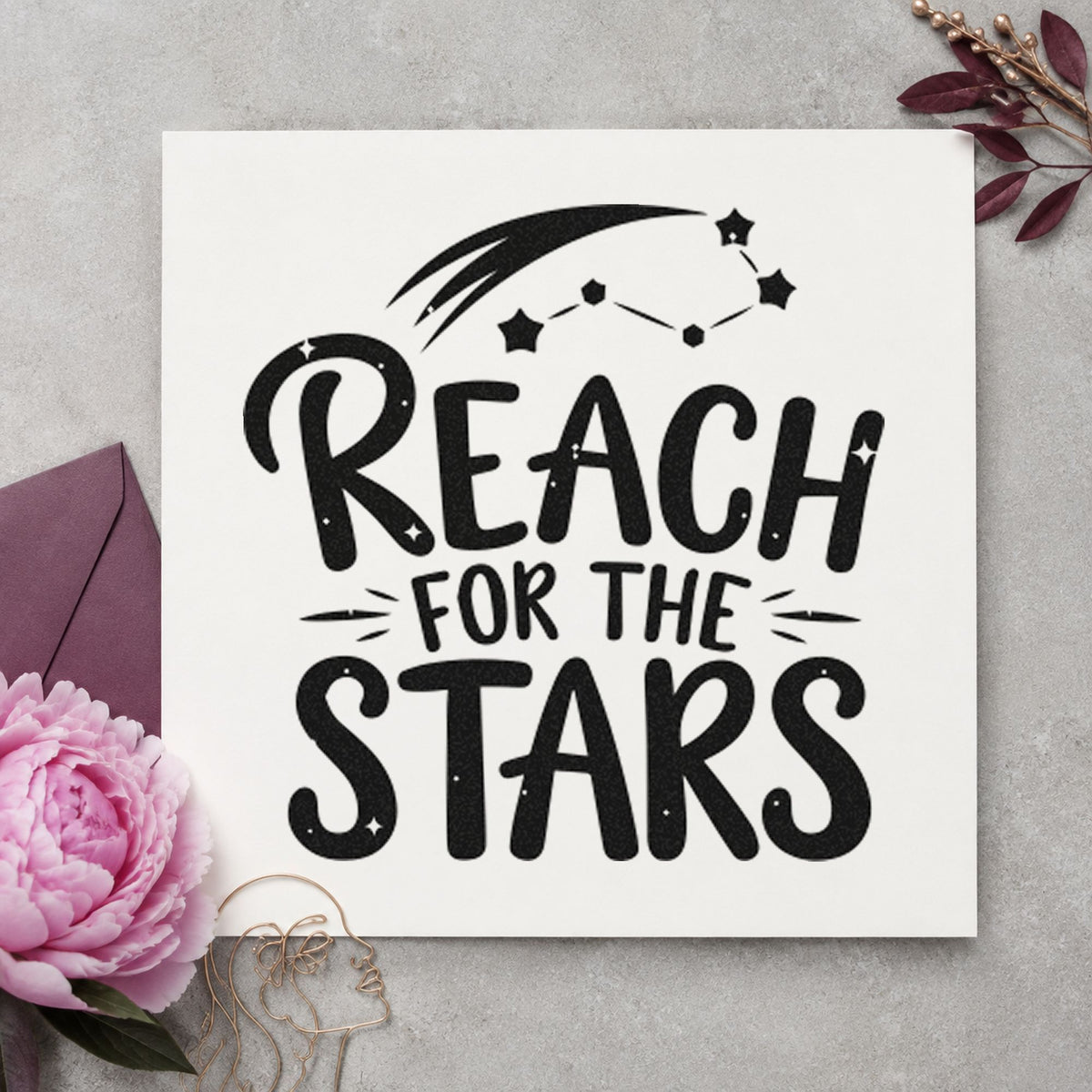 Reach For The Stars craft stamp imprint in black ink on a handmade project, one idea being patch set gift tags.