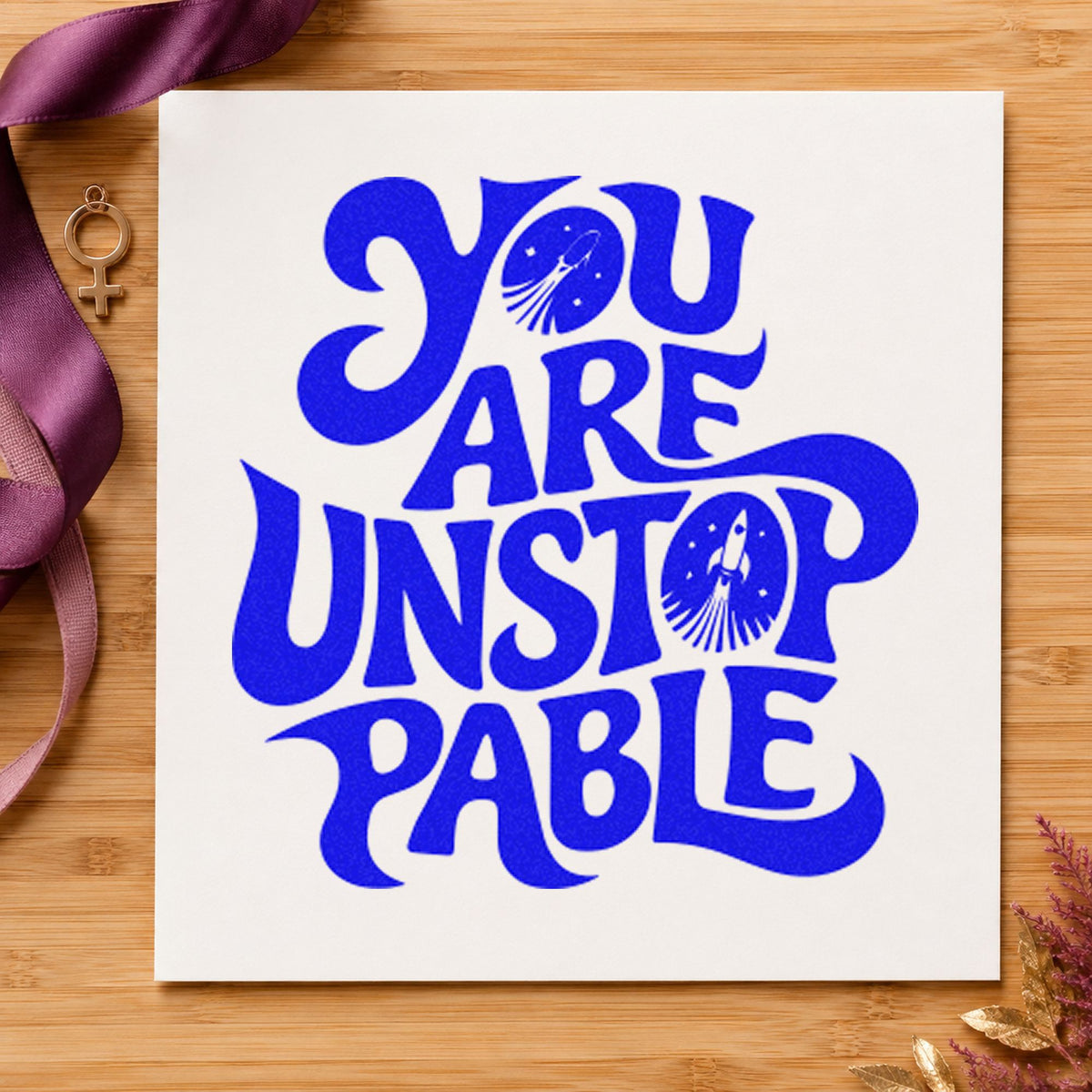 You Are Unstoppable Lettering craft stamp in blue ink on cardstock, an easy option for bench towel printing.