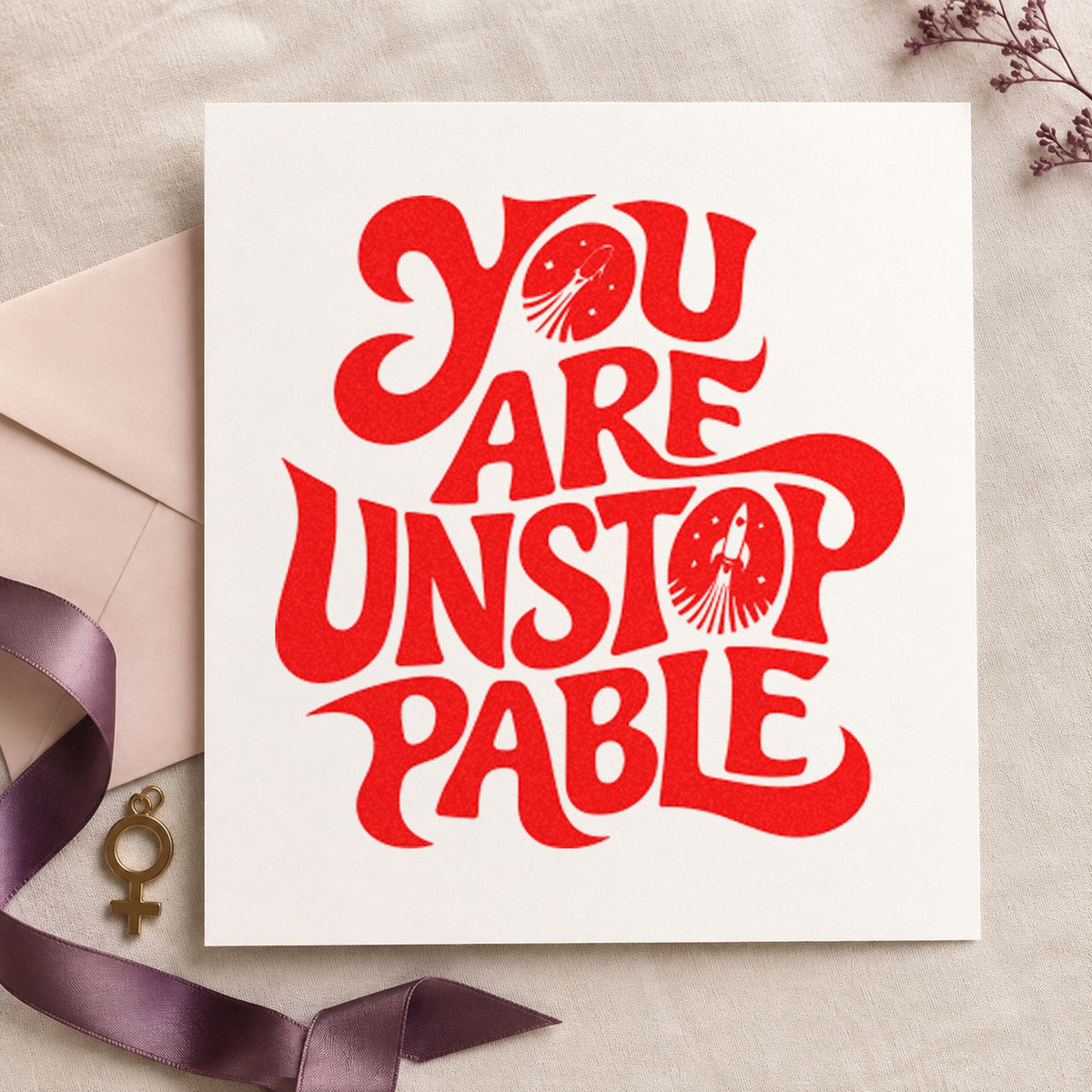 You Are Unstoppable Lettering craft stamp imprint in red ink on a handmade project, one idea being line plan cards.