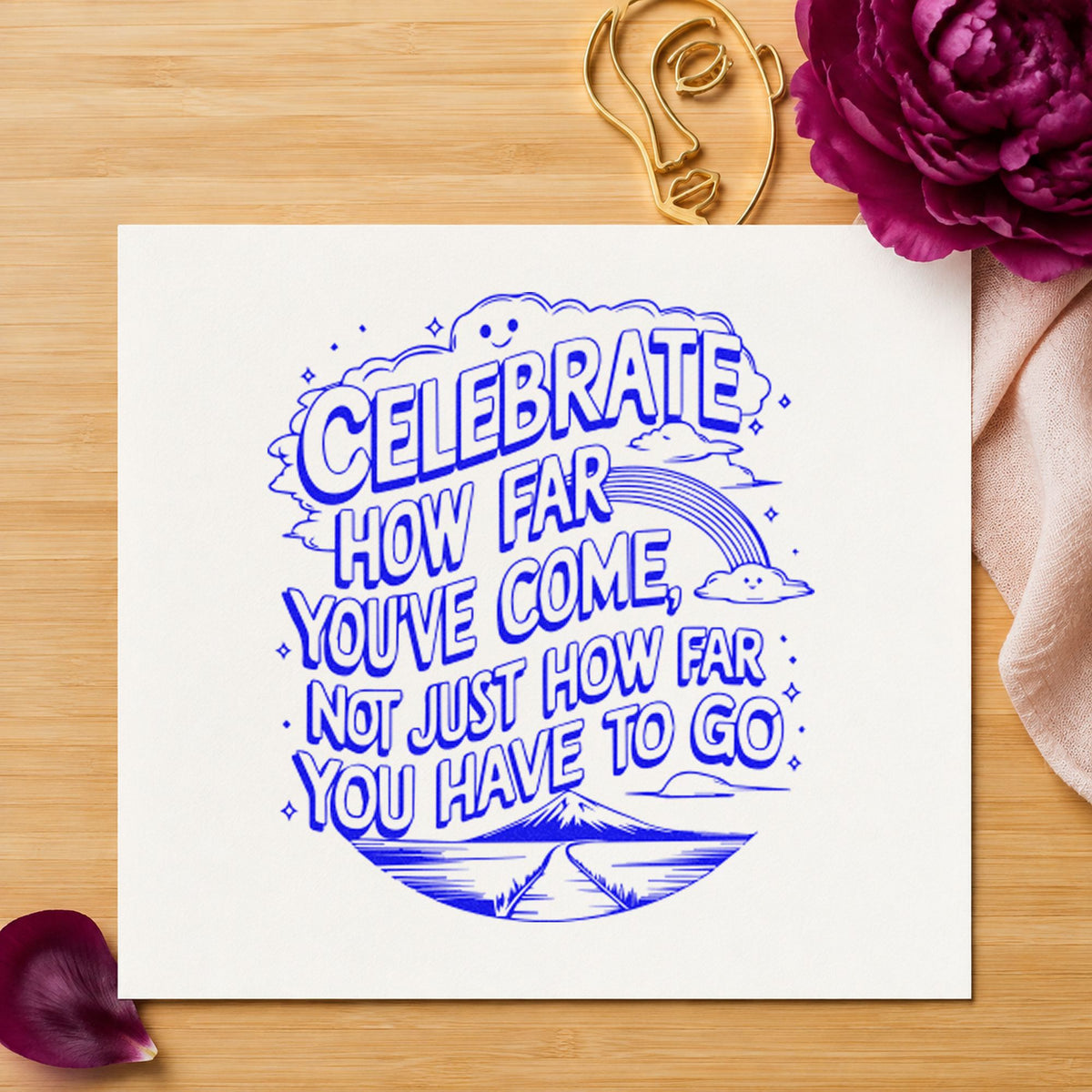Celebrate How Far Come craft stamp in blue ink on cardstock, an easy option for book bag printing.