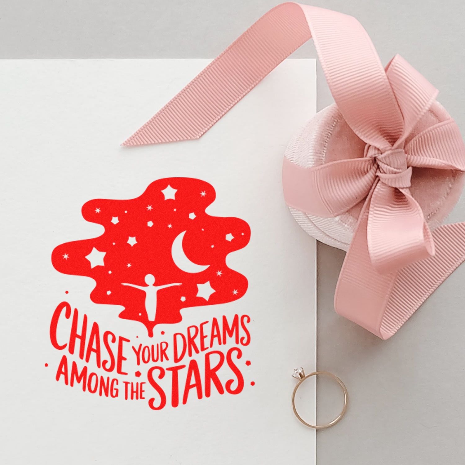 Inspirational rubber stamp design with Chase Your Dreams Among the Stars and moon-and-stars motif on a white card.