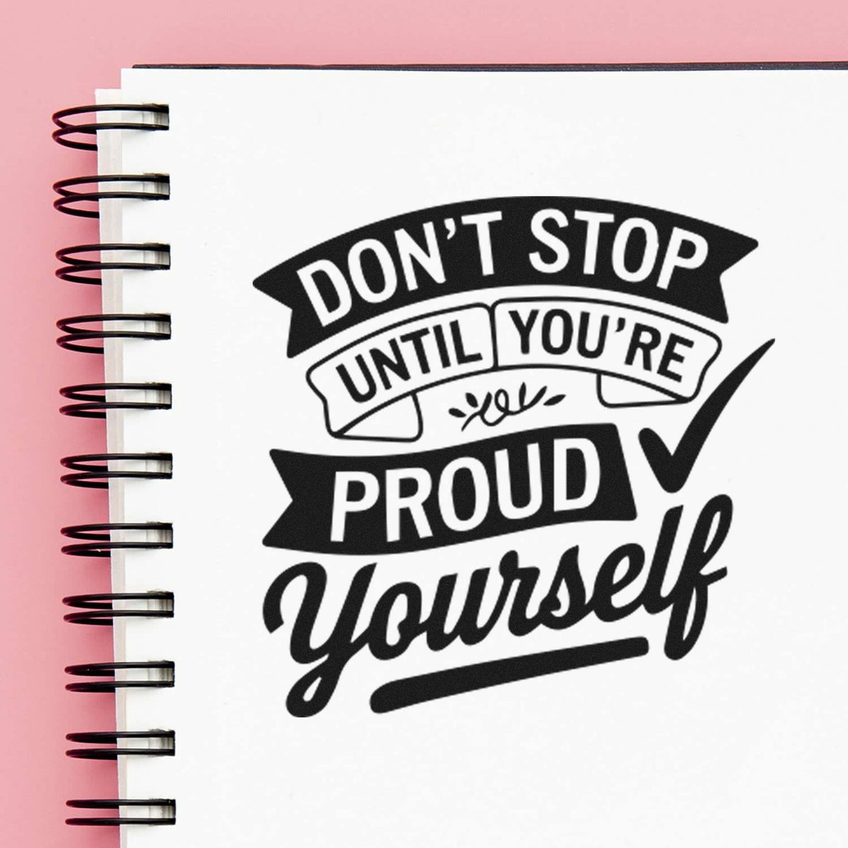 Motivational rubber stamp design with "Don't stop until you're proud of yourself" for planners, journals, and handmade crafts.