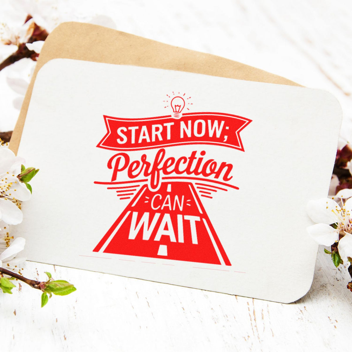 Motivational rubber stamp design with Start Now, Perfection Can Wait message for stationery, crafts, and branding.