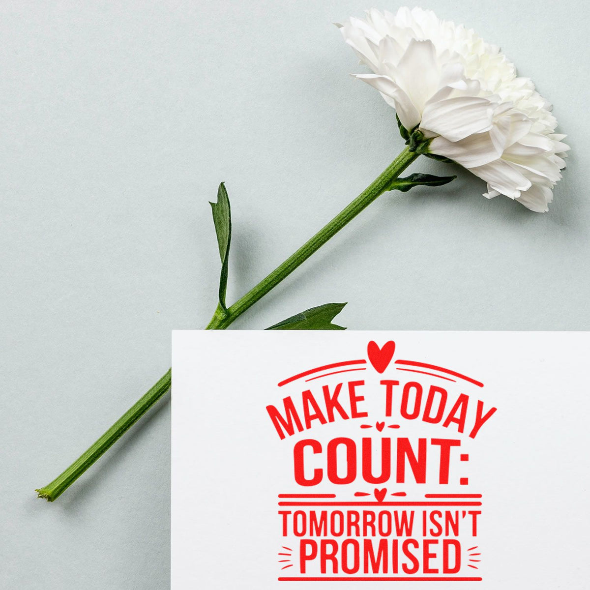 Custom motivational rubber stamp with Make Today Count: Tomorrow Isnt Promised message on a floral background.