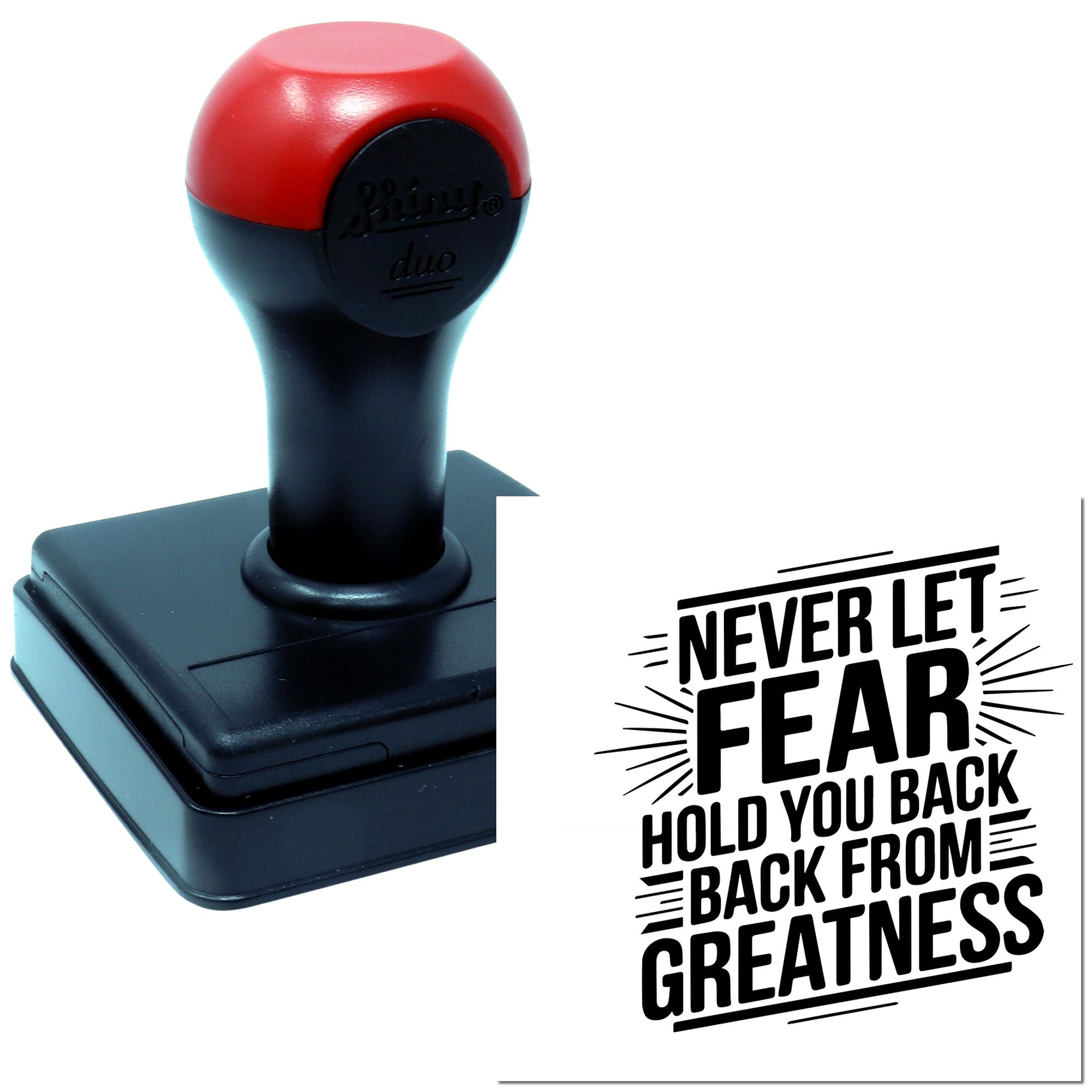 Custom self-inking rubber stamp with motivational quote, Never let fear hold you back from greatness, for inspirational branding.