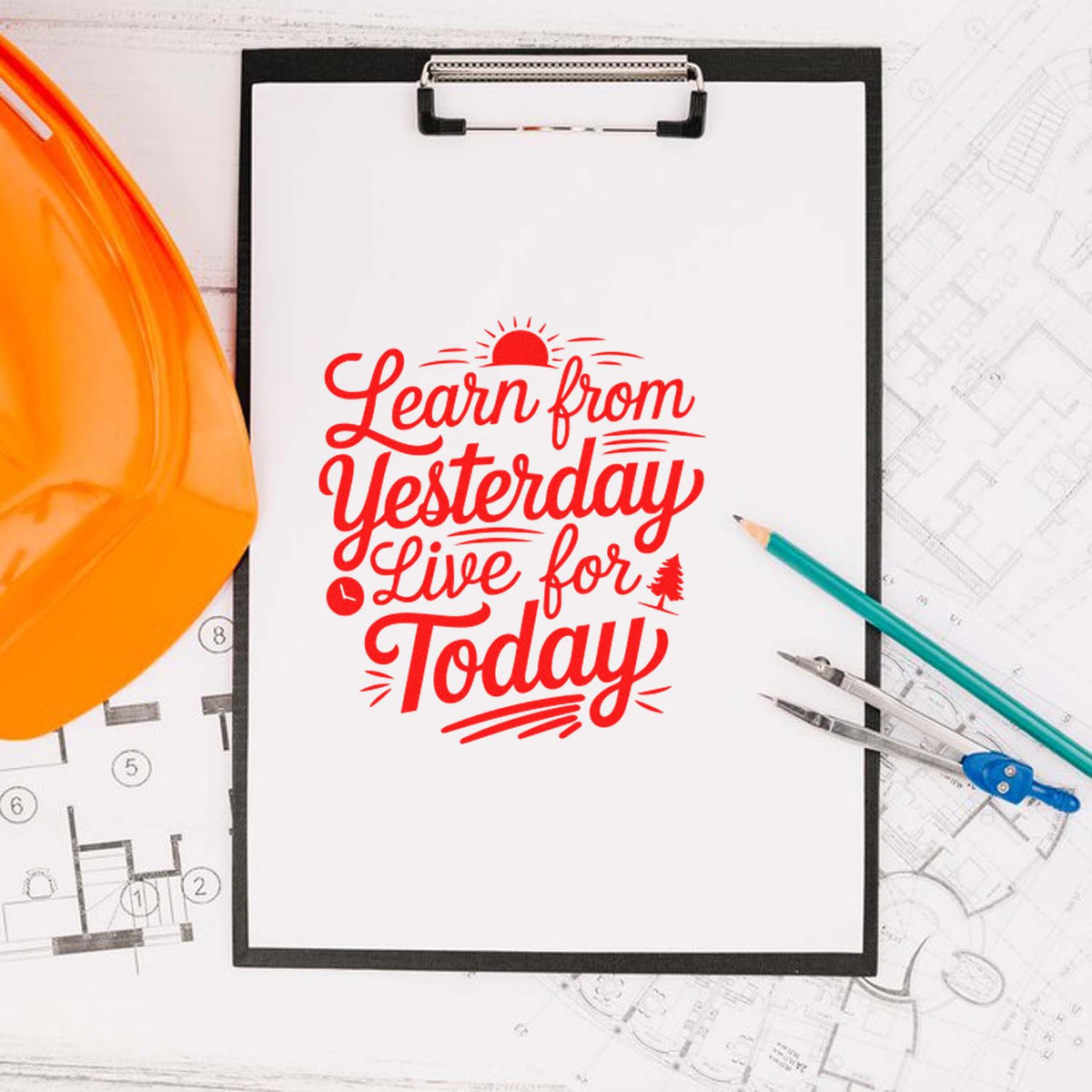 Red rubber stamp design reading Learn from Yesterday, Live for Today on clipboard with blueprints, hard hat, and drafting tools.
