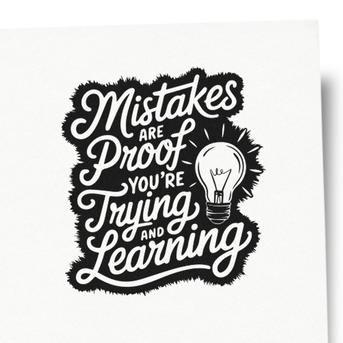 Motivational rubber stamp design with Mistakes are proof you're trying and learning and a light bulb icon.