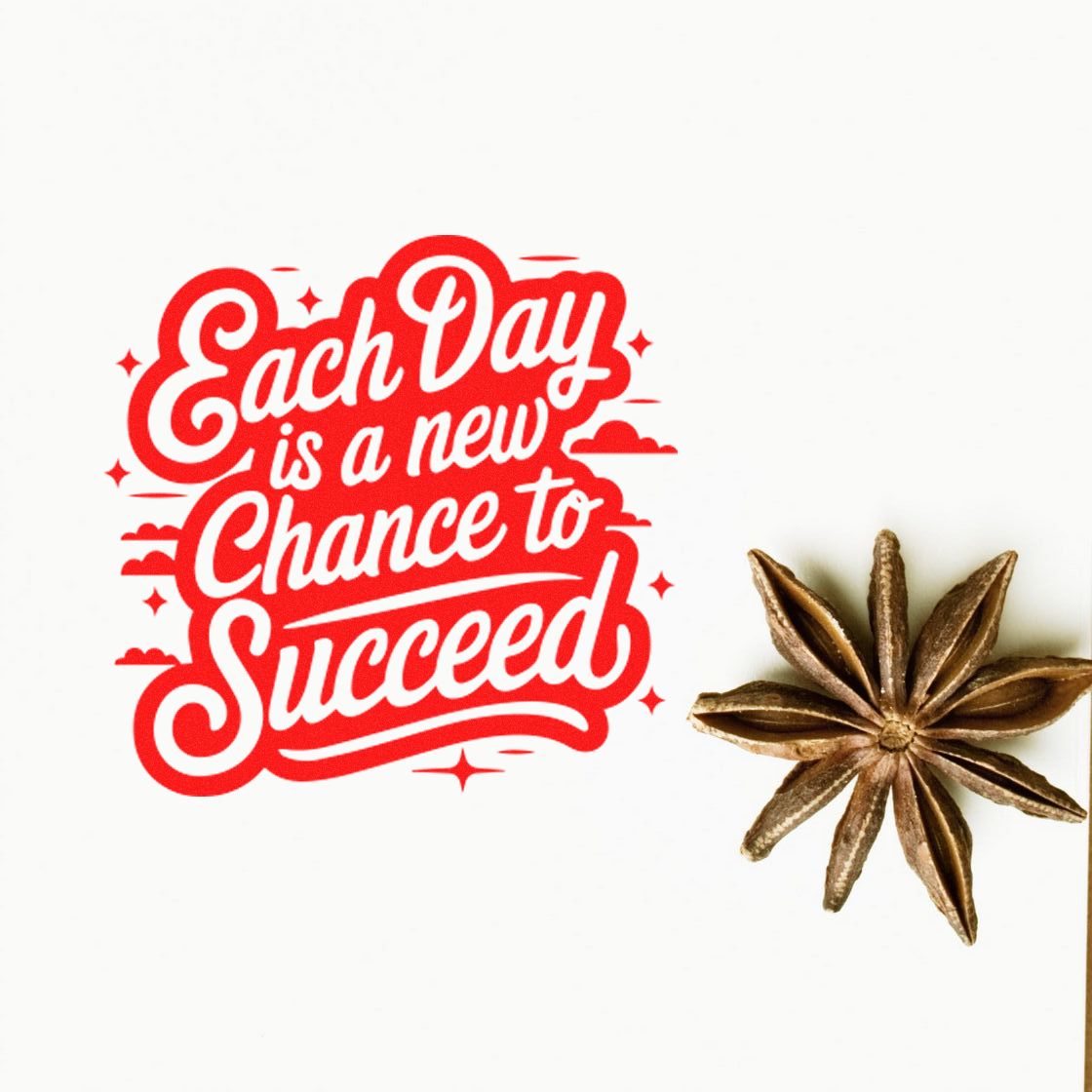 Motivational rubber stamp design reading Each Day is a new Chance to Succeed in bold red script with star anise accent.