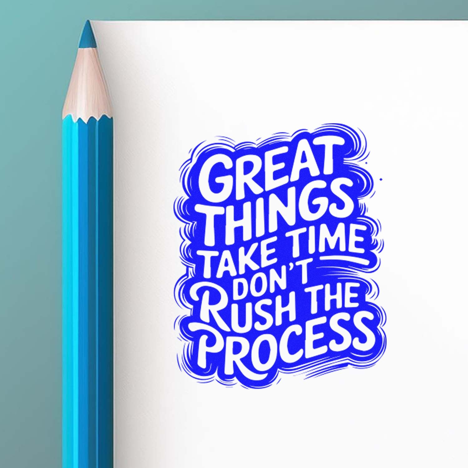Motivational rubber stamp design reading Great things take time, dont rush the process on notebook beside pencil.