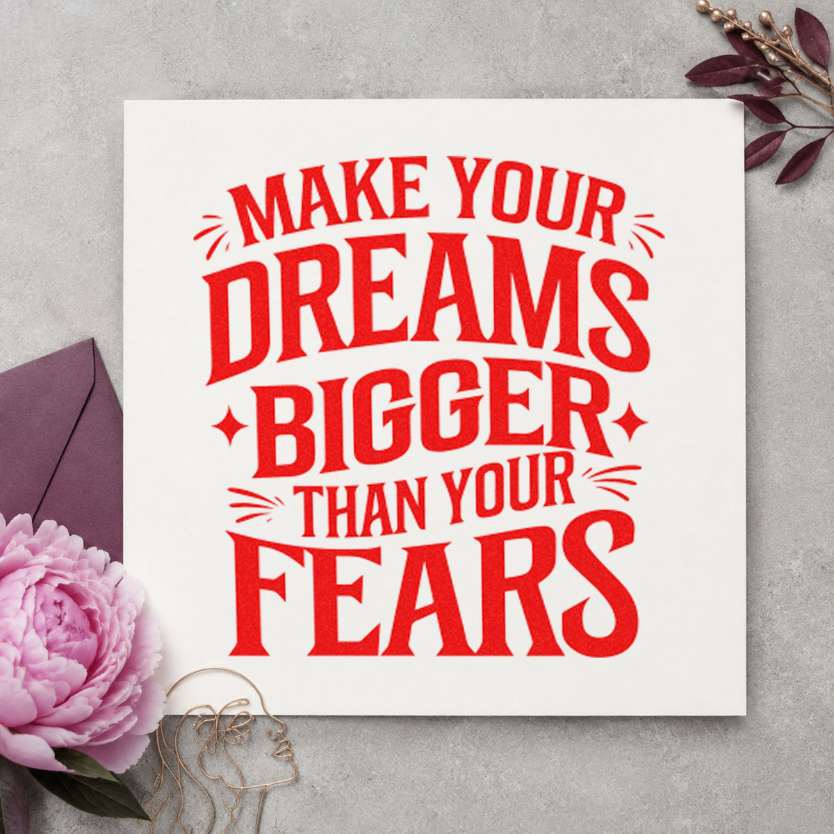 Dreams Bigger Than Fears craft stamp imprint in red ink on a handmade project, one idea being run note cards.