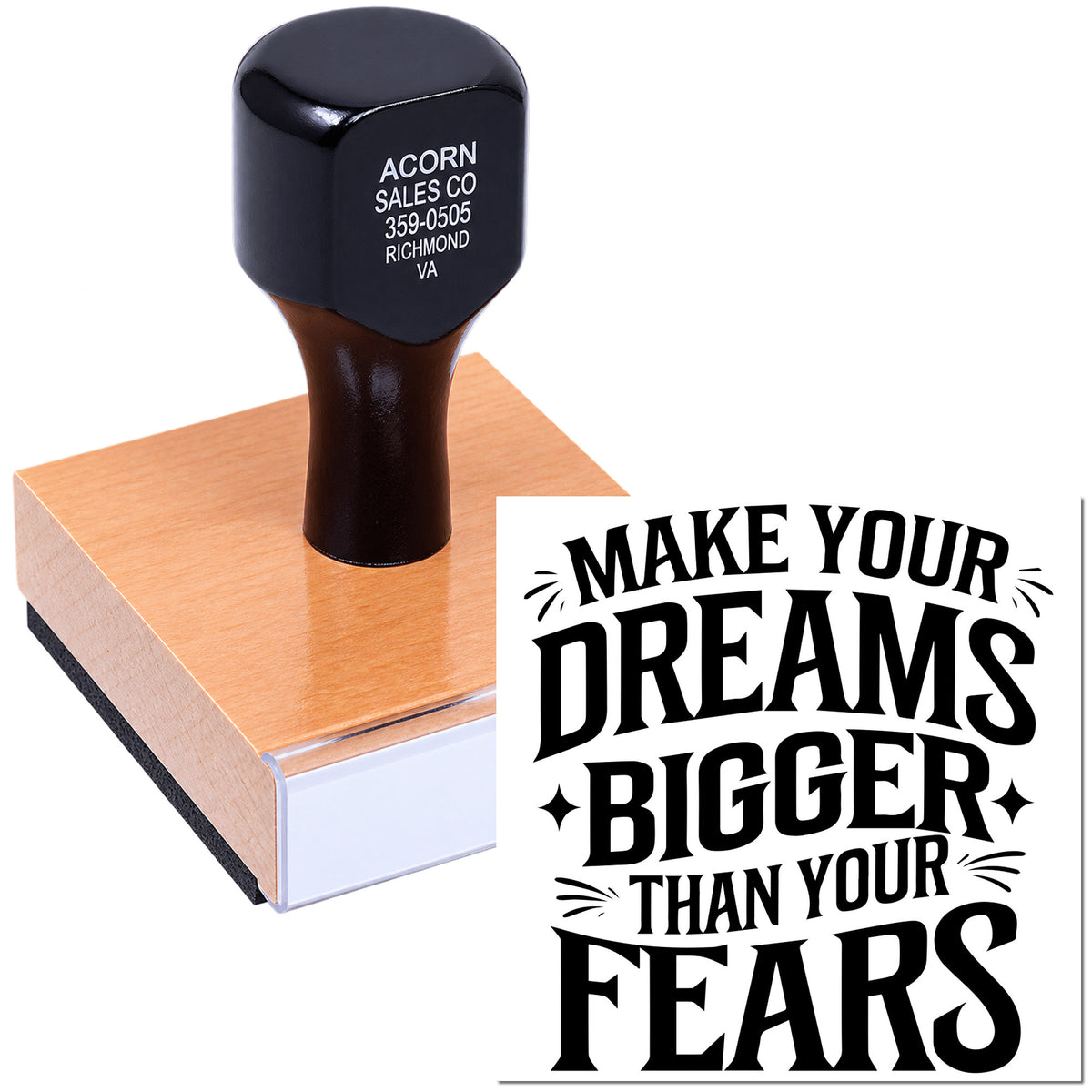 Custom rubber stamp with motivational quote, shown imprinting Make your dreams bigger than your fears on a block.