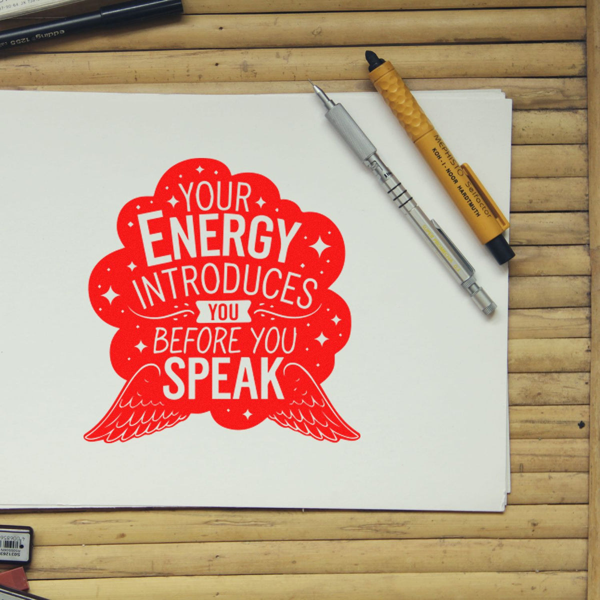 Energy Introduces Before Speak rubber stamp shown in red ink, stamped for projects such as event night album page.