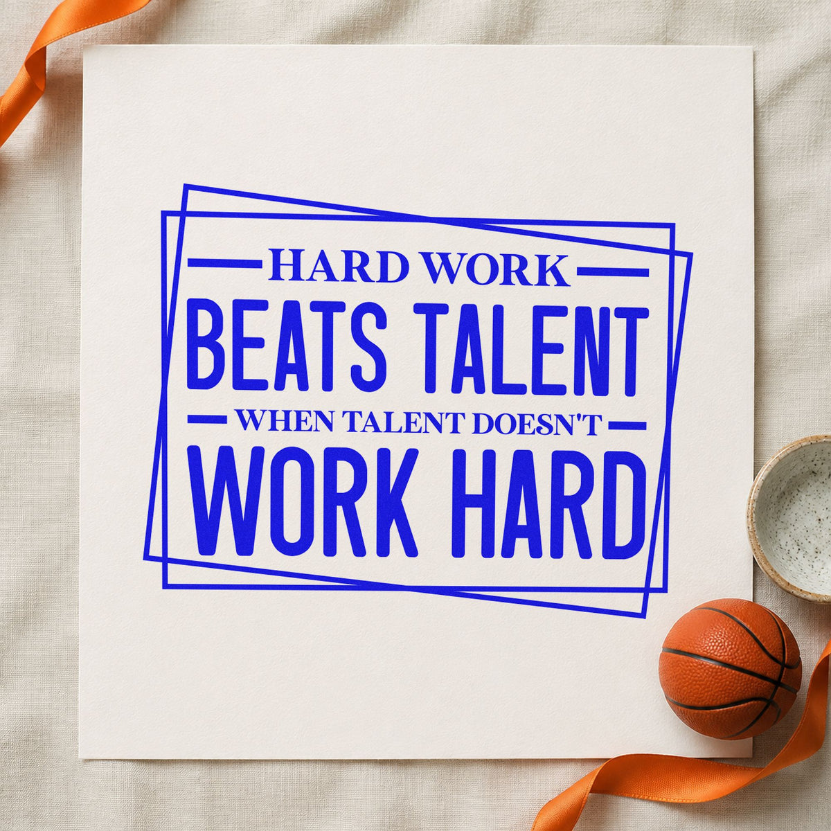 Hard Work Beats Talent craft stamp in blue ink on cardstock, an easy option for camp tee printing.