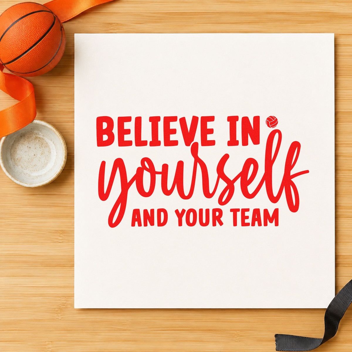 Believe Yourself And Team rubber stamp shown in red ink, stamped for projects such as bin serving labels.