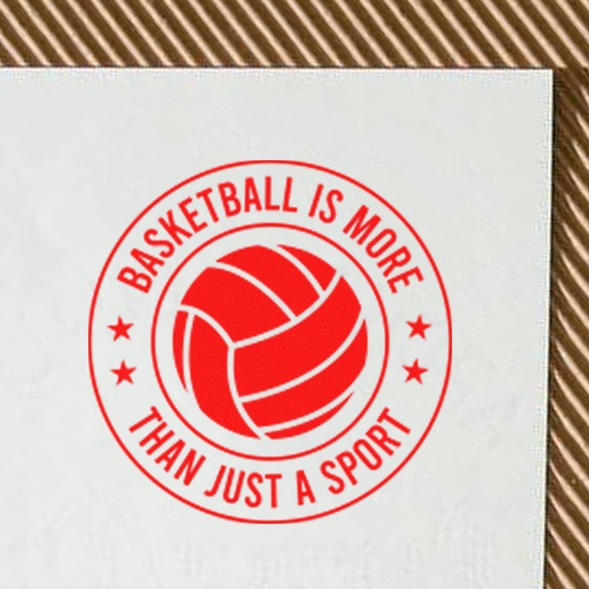 Basketball rubber stamp design with red circular logo and slogan Basketball is more than just a sport.