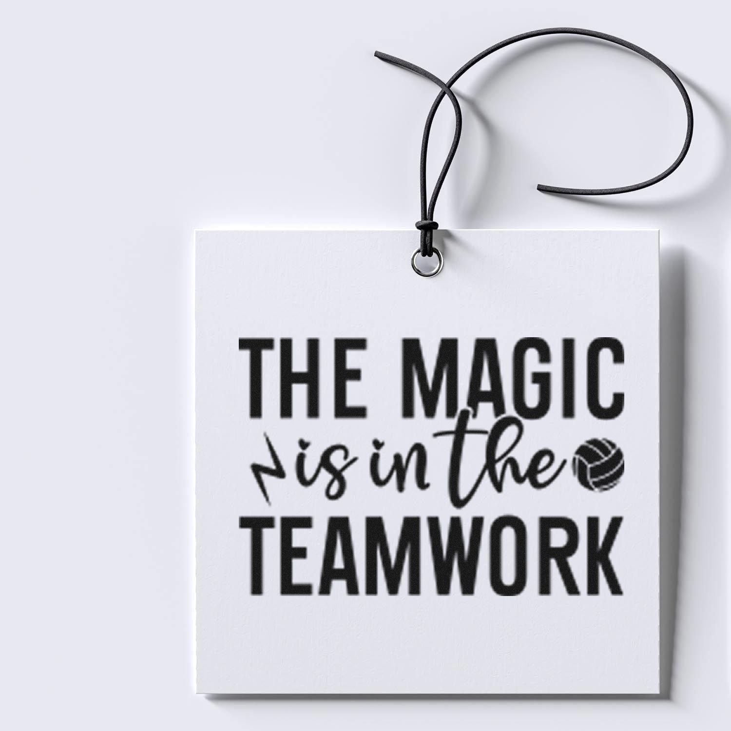 Inspirational rubber stamp design reading The magic is in the teamwork on a hanging gift tag.