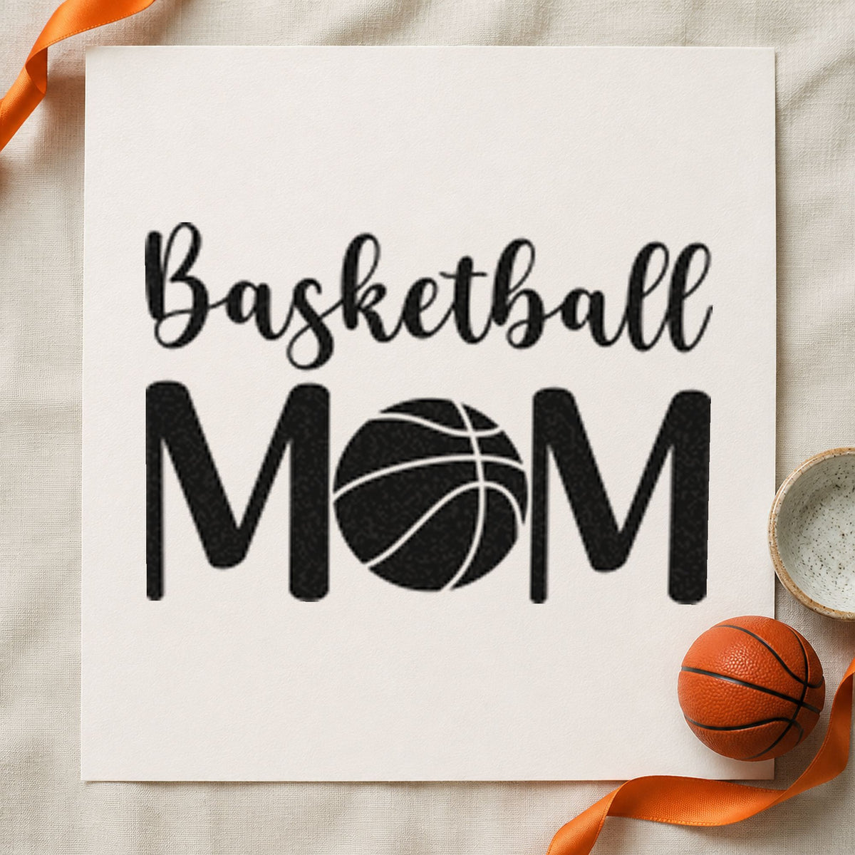 Basketball Mom Ball Letter craft stamp imprint in black ink on a handmade project, one idea being spare kit gift tags.