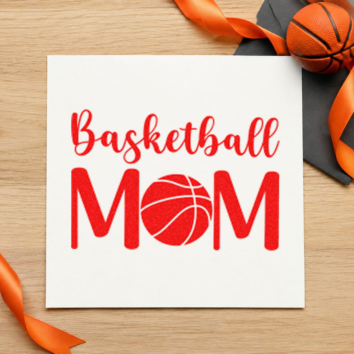 Basketball Mom Ball Letter craft stamp imprint in red ink on a handmade project, one idea being emergency kit cards.