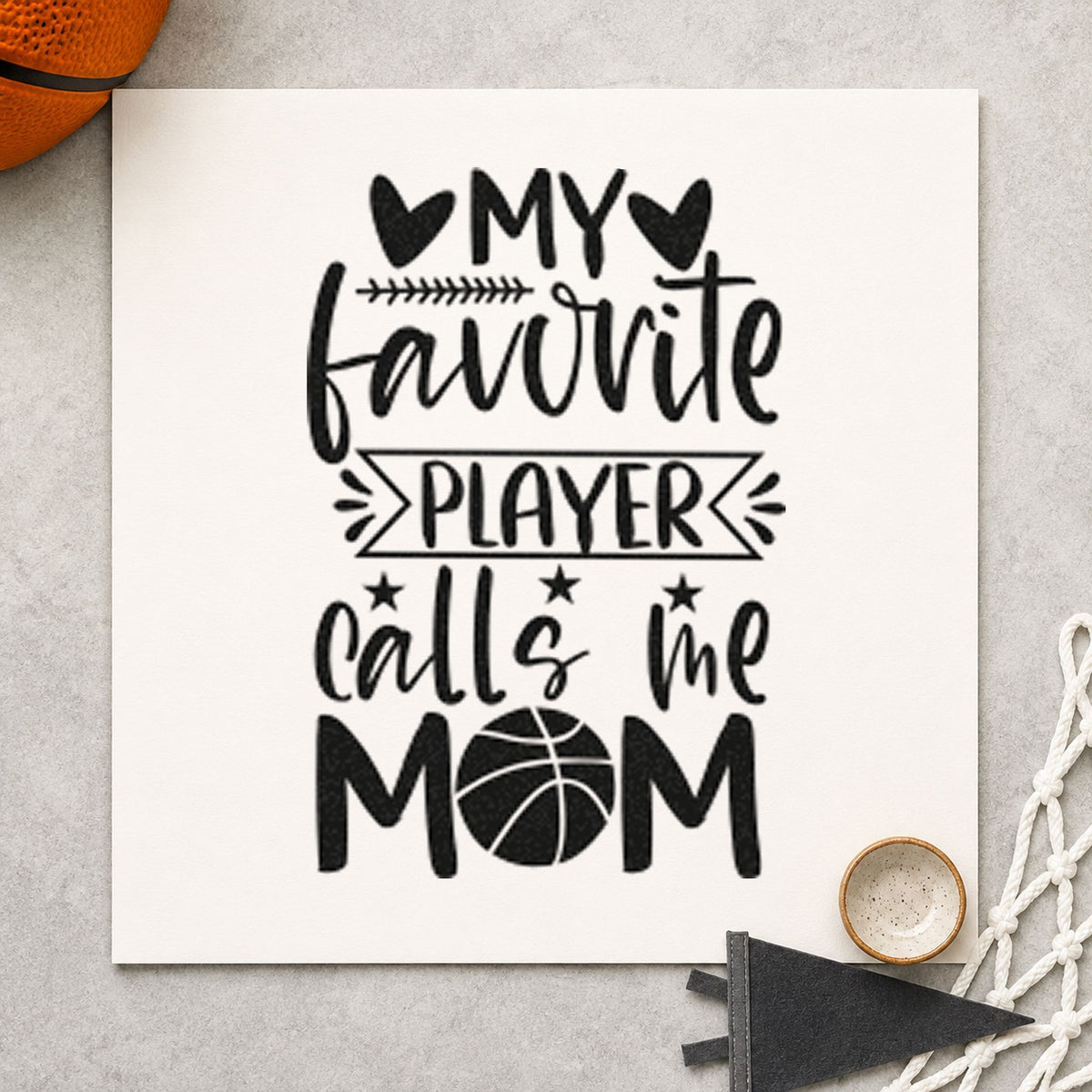 Favorite Player Calls Mom craft stamp imprint in black ink on a handmade project, one idea being copy set gift tags.