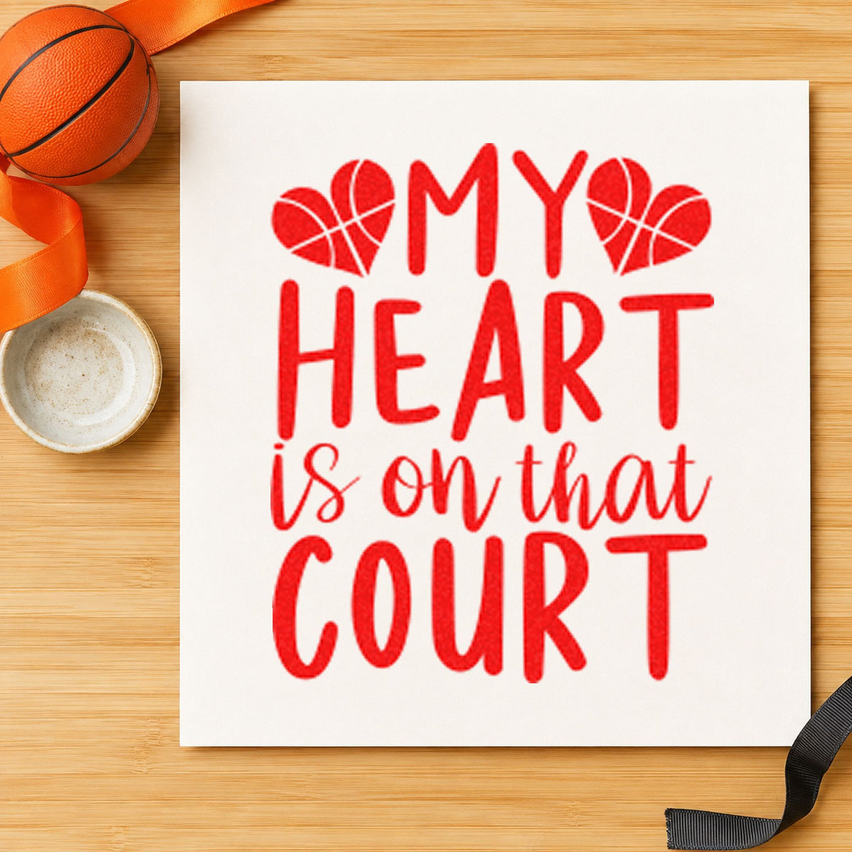 Heart On That Court rubber stamp shown in red ink, stamped for projects such as bin road labels.