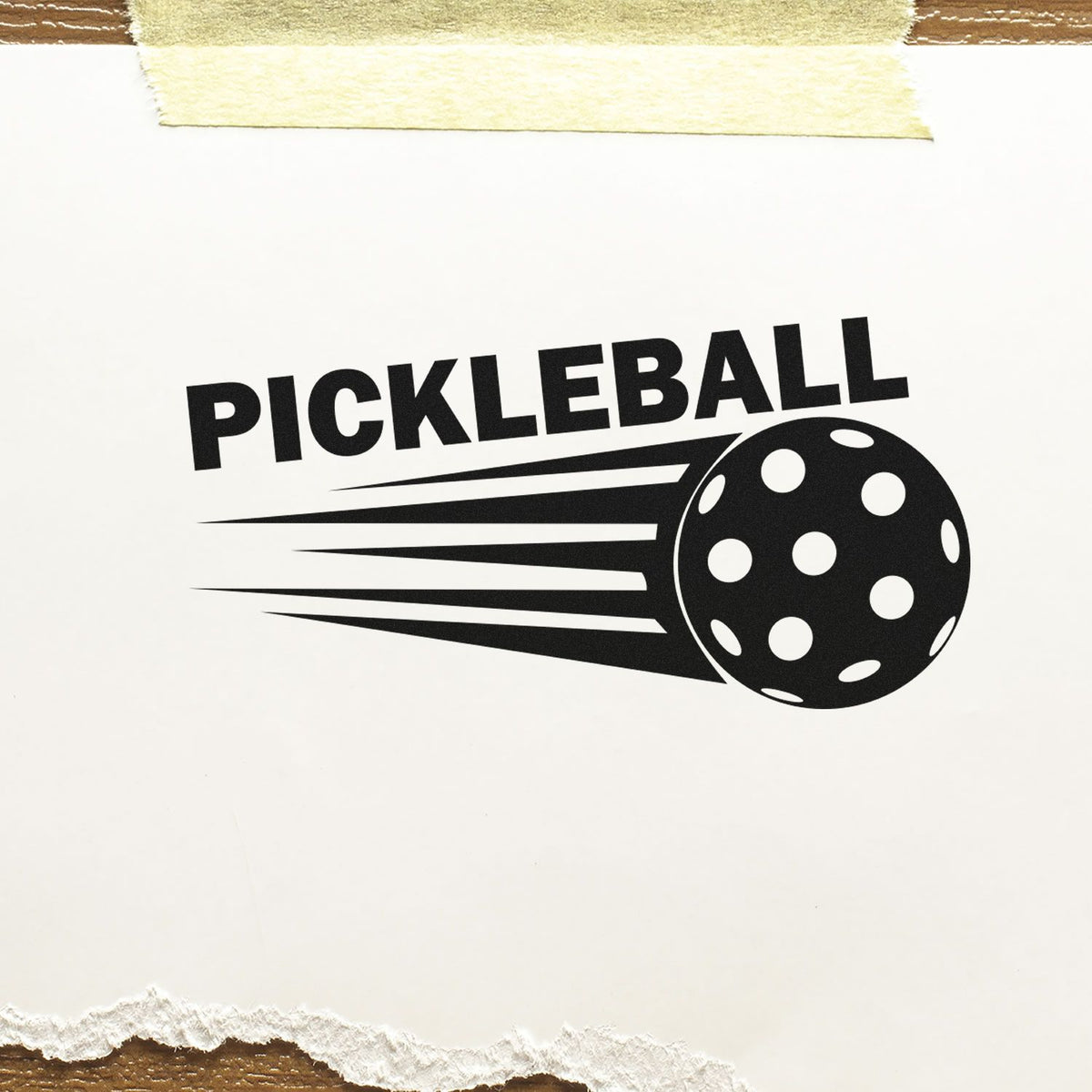 Pickleball Speeding Ball Slim Pre-Inked Stamp imprint stamped in black ink. PICKLEBALL appears above a perforated ball with long speed lines.