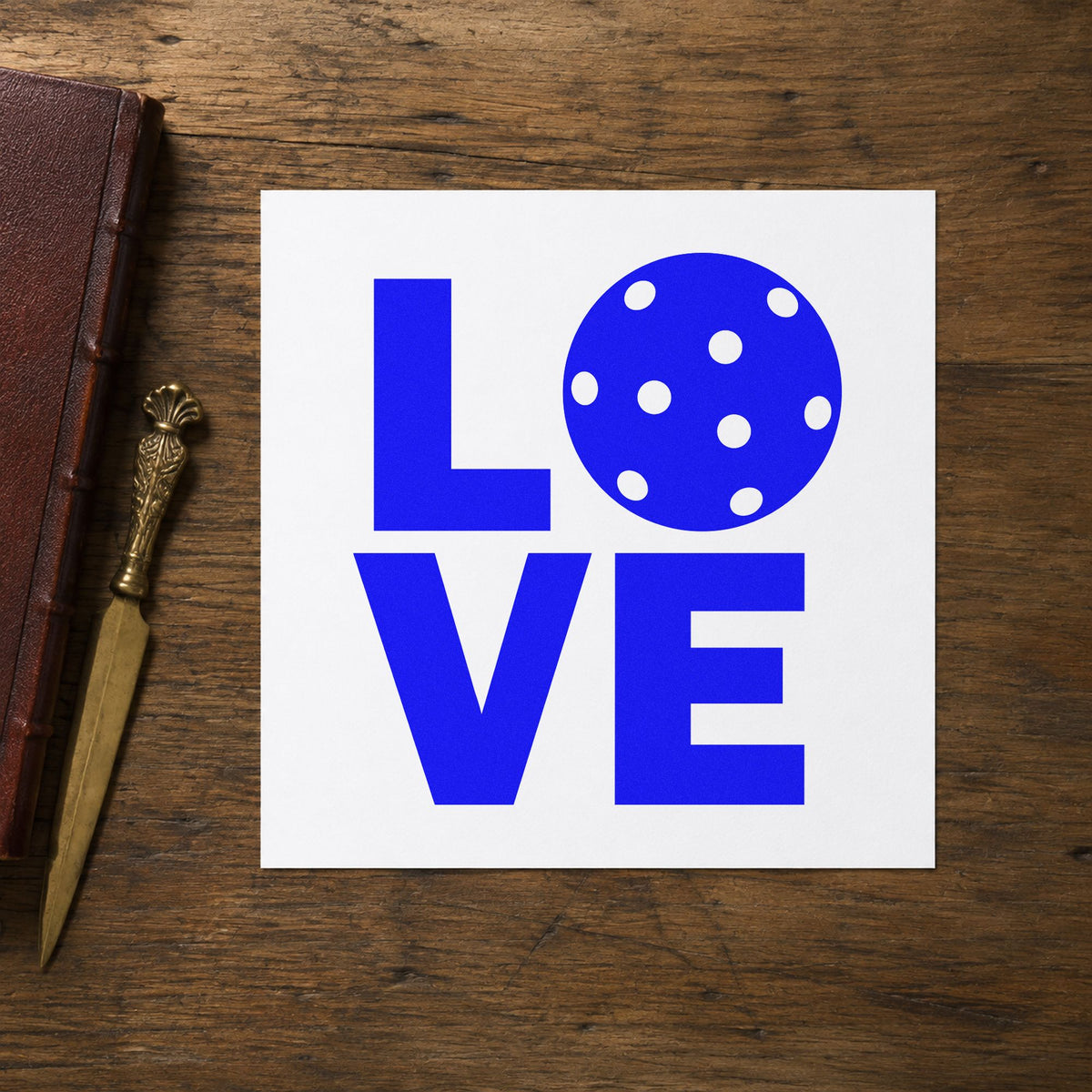 Stacked Love Pickleball Ball craft stamp in blue ink on cardstock, an easy option for bunting panel printing.