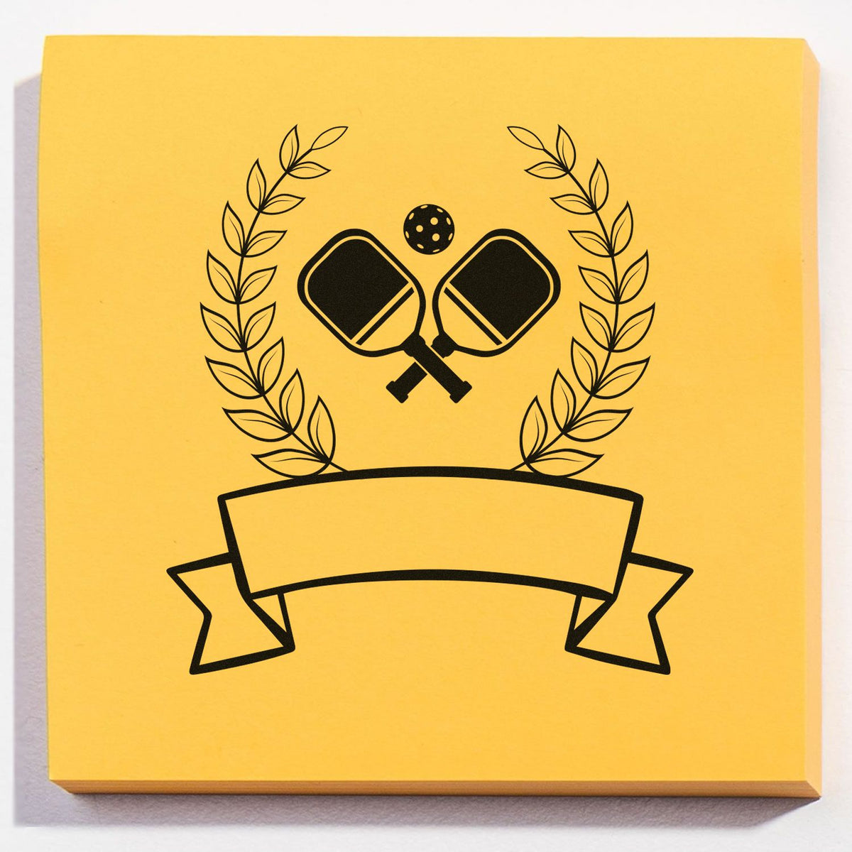 Custom pickleball rubber stamp design with crossed paddles, laurel wreath, and blank banner for personalized sports branding.