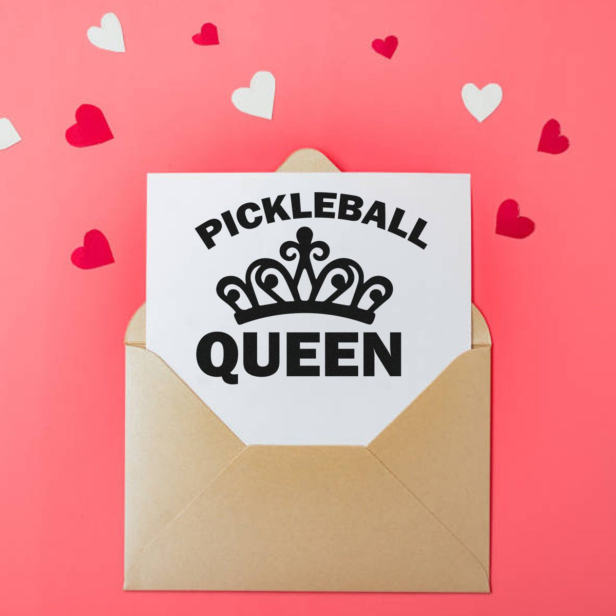 Pickleball Queen rubber stamp design on envelope, surrounded by pink hearts, for custom sports gift packaging.