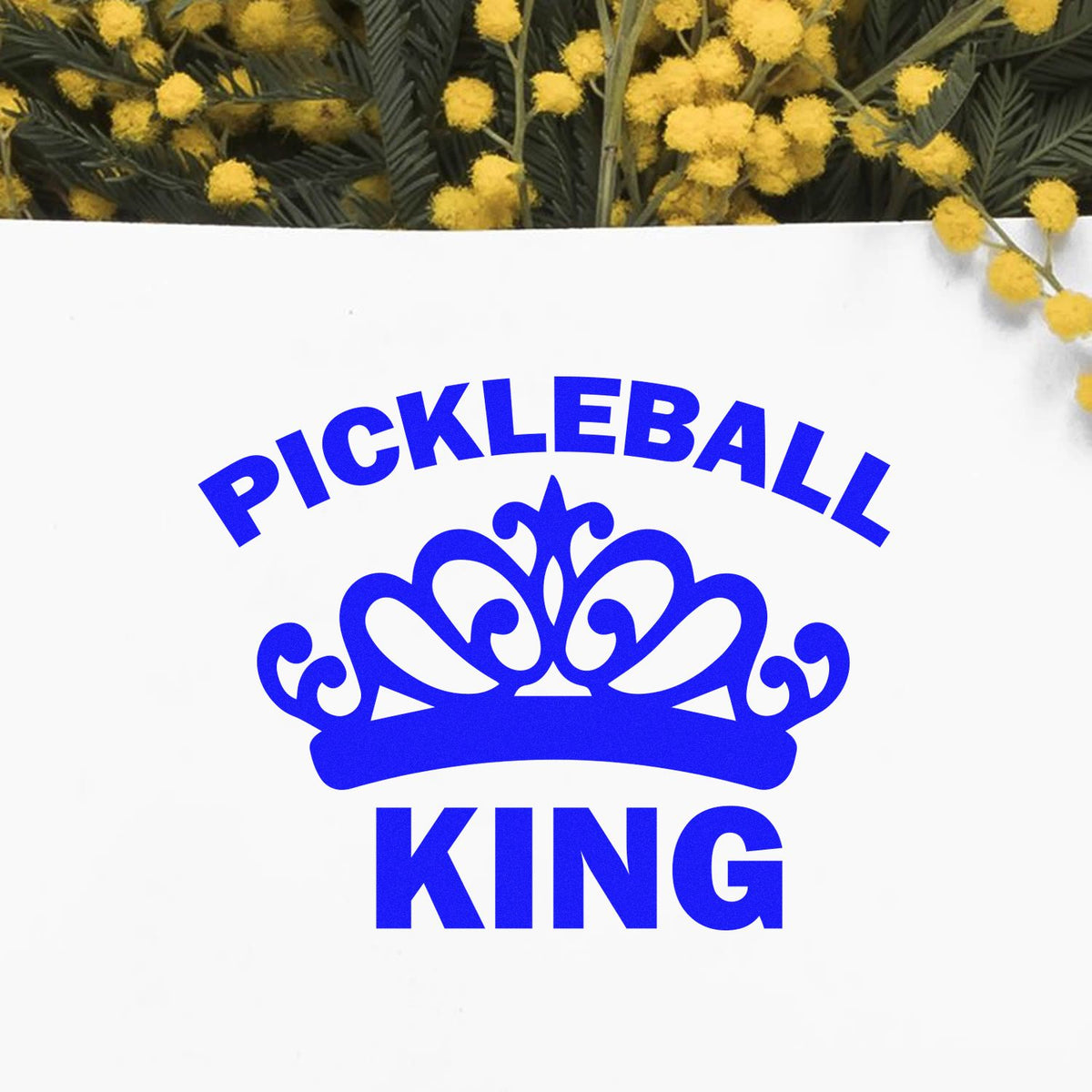 Blue Pickleball King crown logo for custom rubber stamps, sports branding, and pickleball gifts.