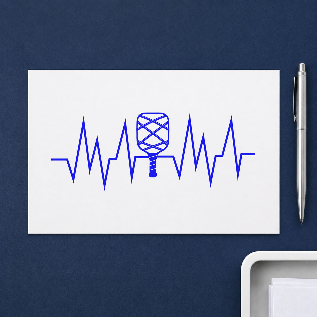 Crosshatched Paddle Heartbeat Line craft stamp in blue ink on cardstock, an easy option for mat towel printing.