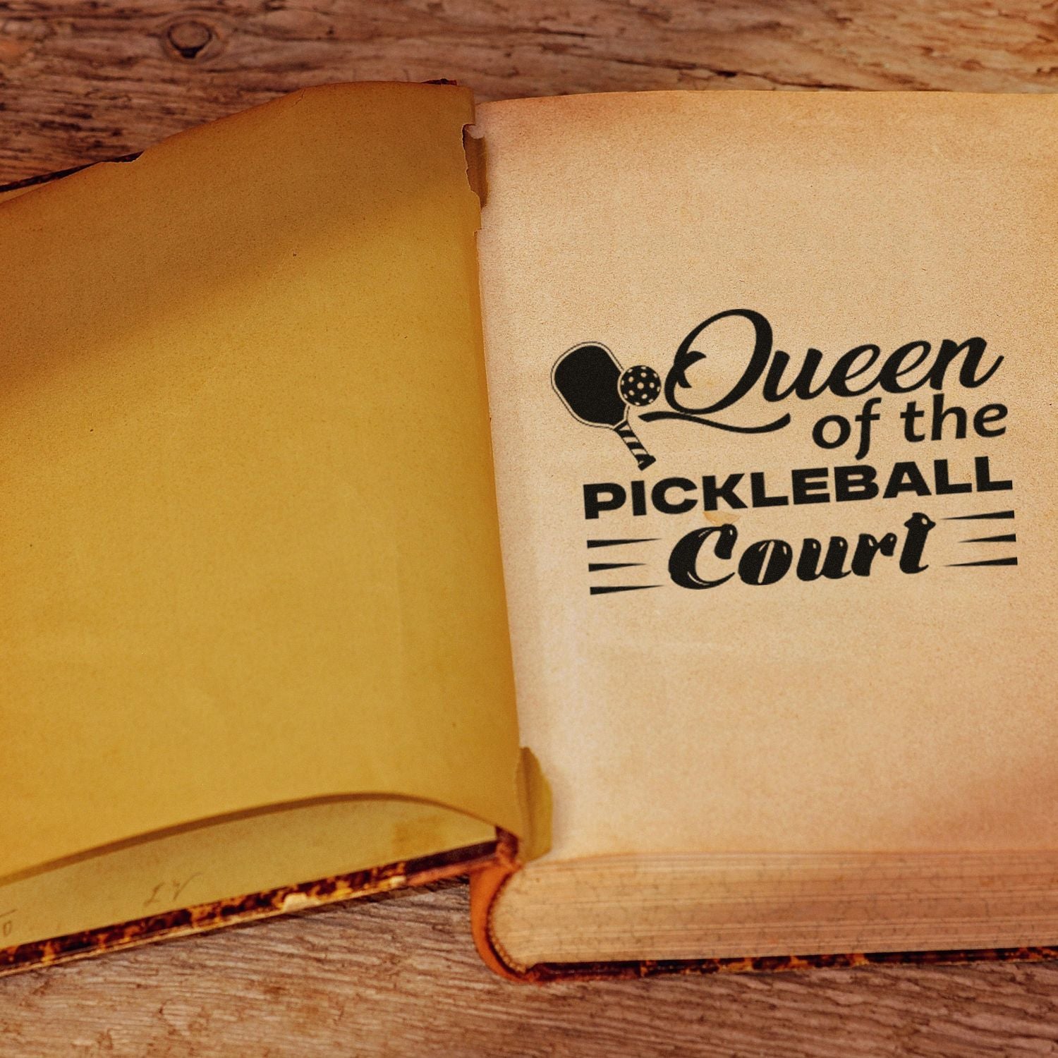 Queen of the Pickleball Court rubber stamp design for custom sports gifts, featuring a pickleball paddle icon on vintage paper.
