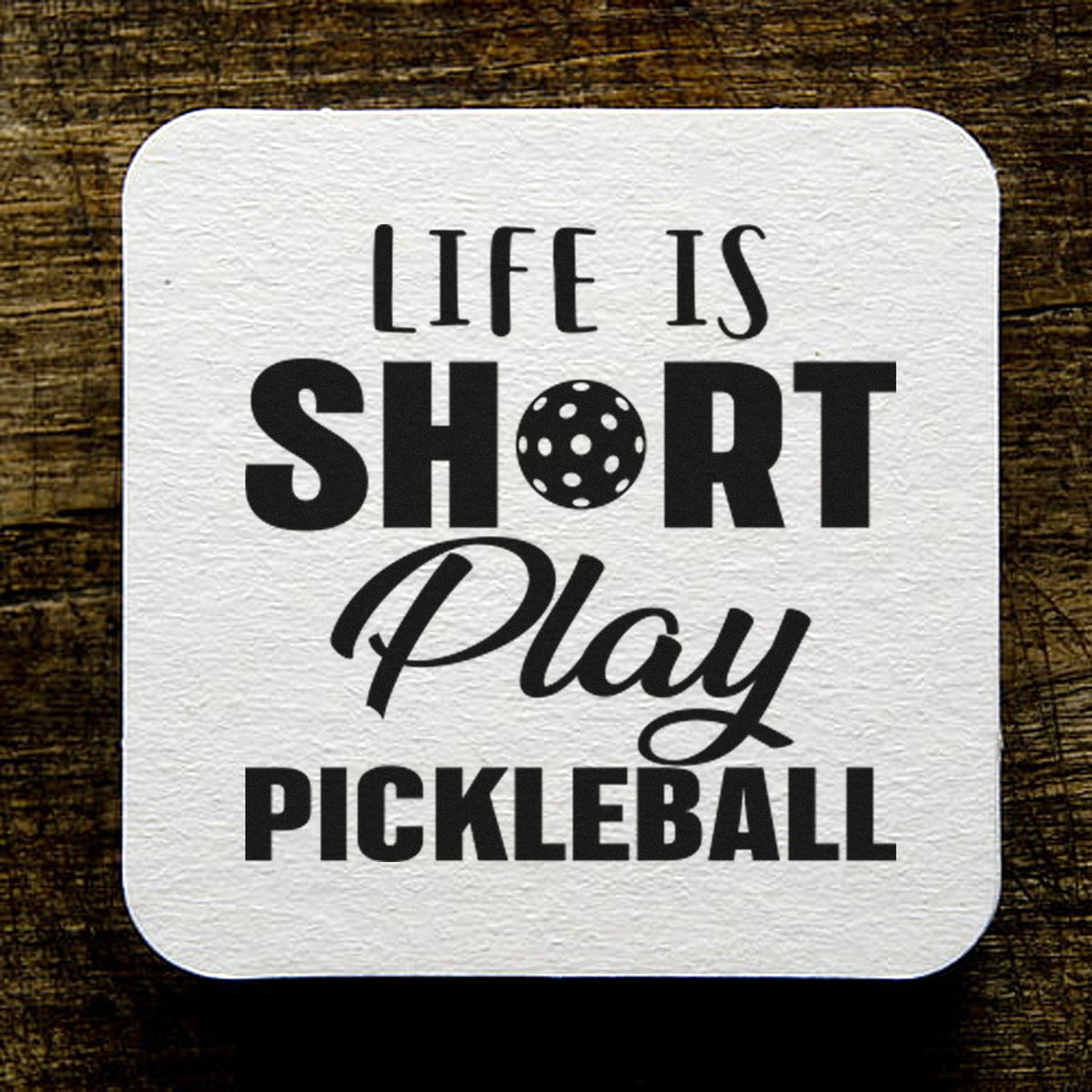 Pickleball rubber stamp design with quote Life is short, play pickleball for sports crafts and custom stamping.