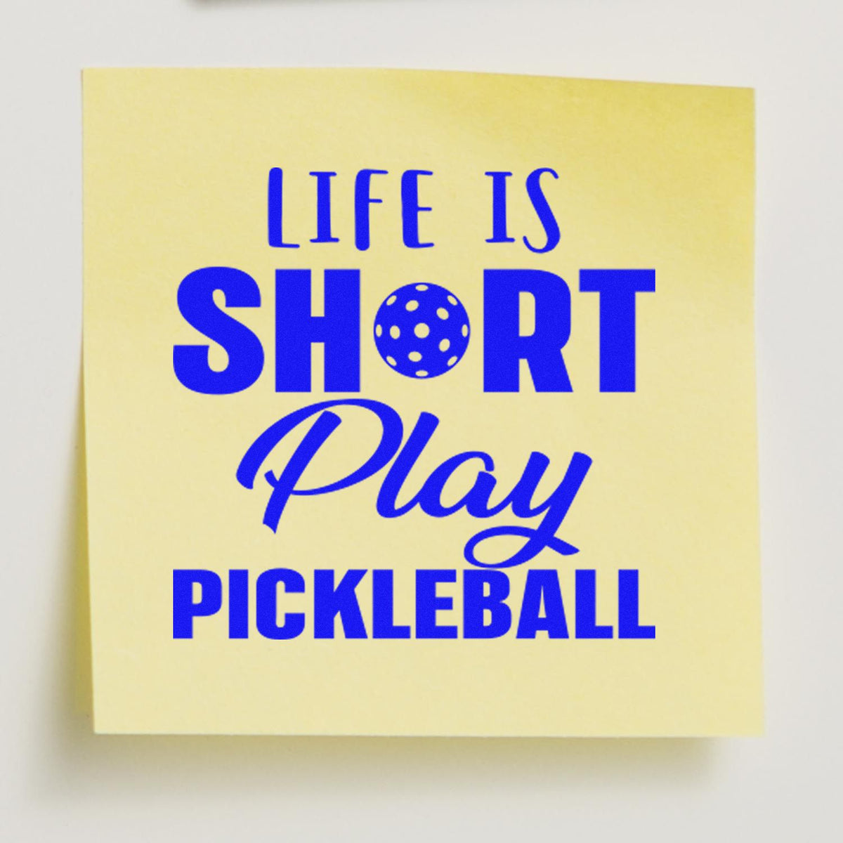 Life is short, play pickleball rubber stamp design in bold blue lettering for sports-themed crafts and custom stamping.