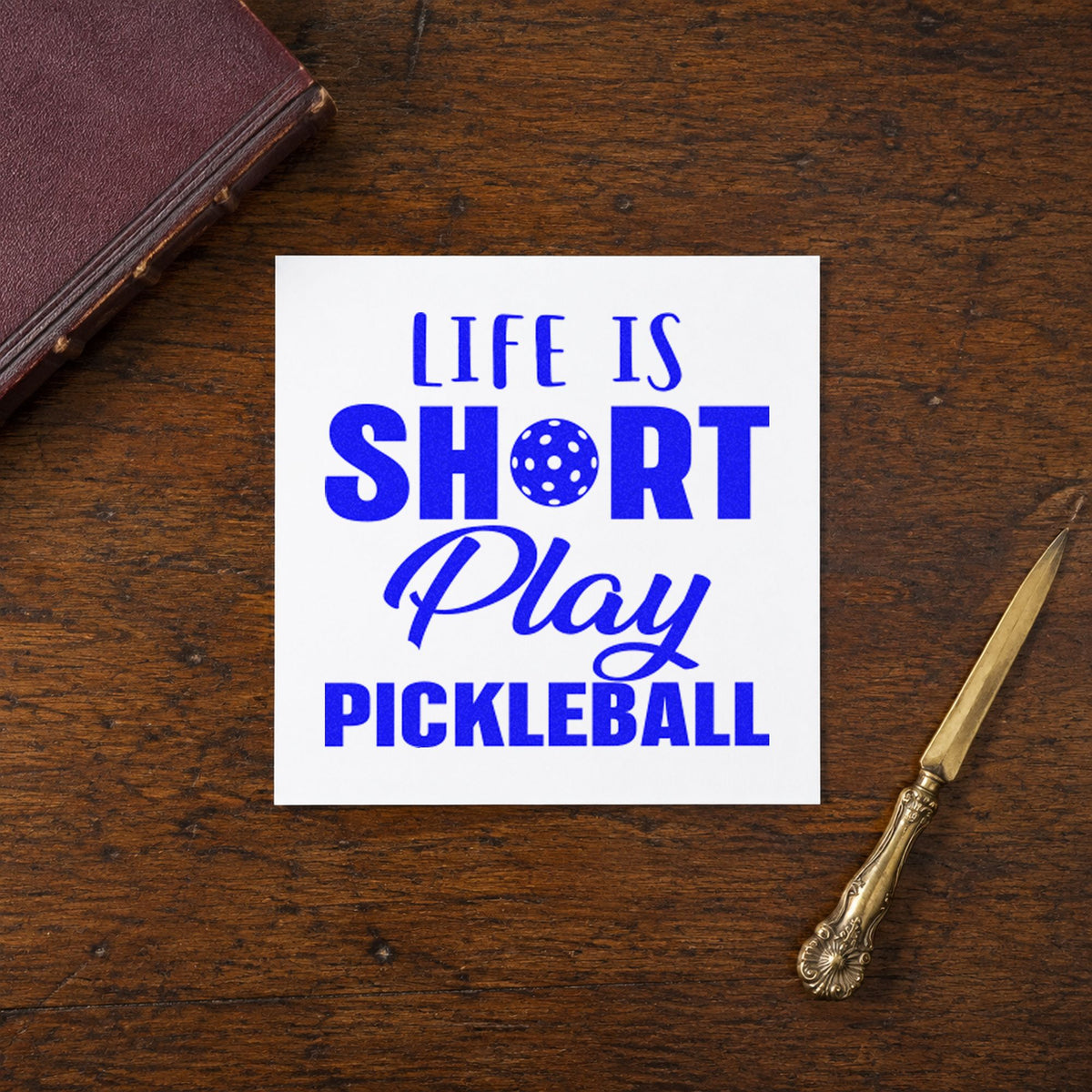 Life Short Play Pickleball craft stamp in blue ink on cardstock, an easy option for beach towel printing.