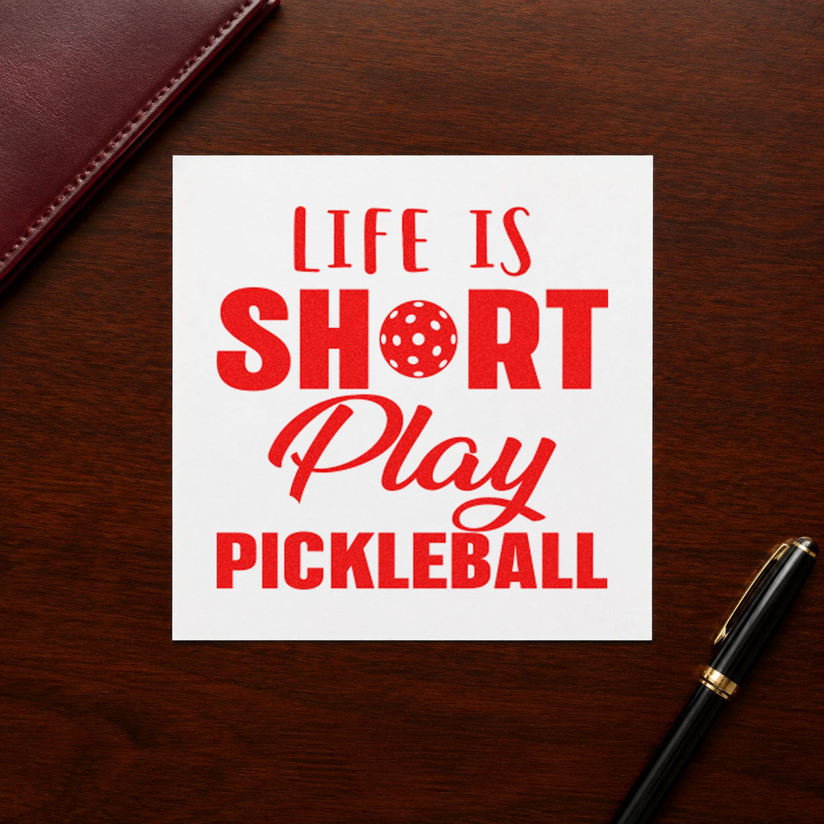 Life Short Play Pickleball craft stamp imprint in red ink on a handmade project, one idea being partner draw cards.