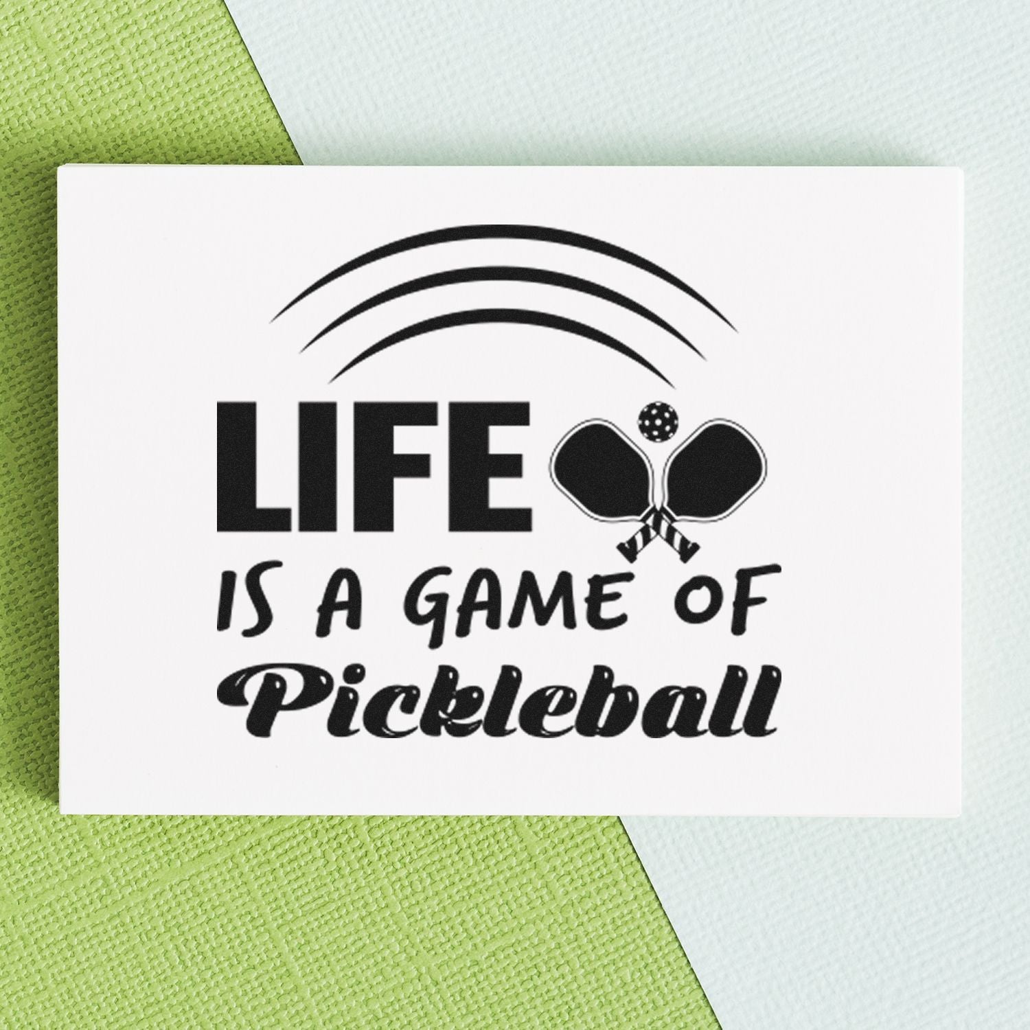 Pickleball rubber stamp design reading Life is a game of Pickleball with paddle icon for custom sports crafts.