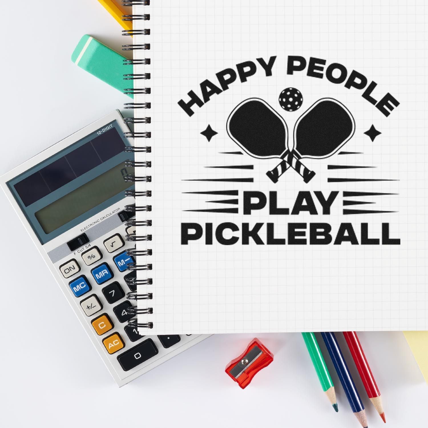 Pickleball rubber stamp design with paddles and slogan Happy People Play Pickleball on notebook.