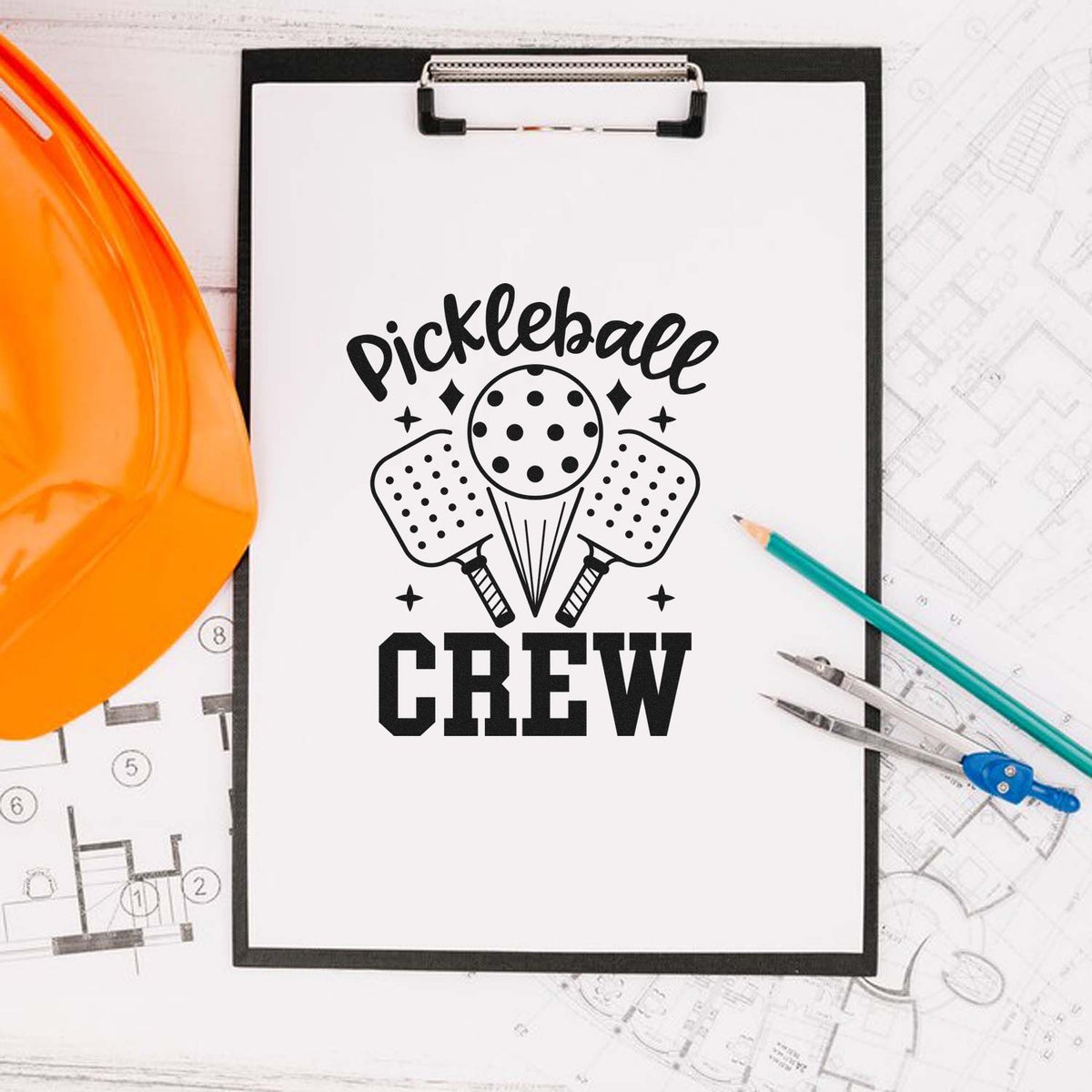 Pickleball Crew rubber stamp mockup with paddles and ball on clipboard, ideal for custom sports-themed branding.