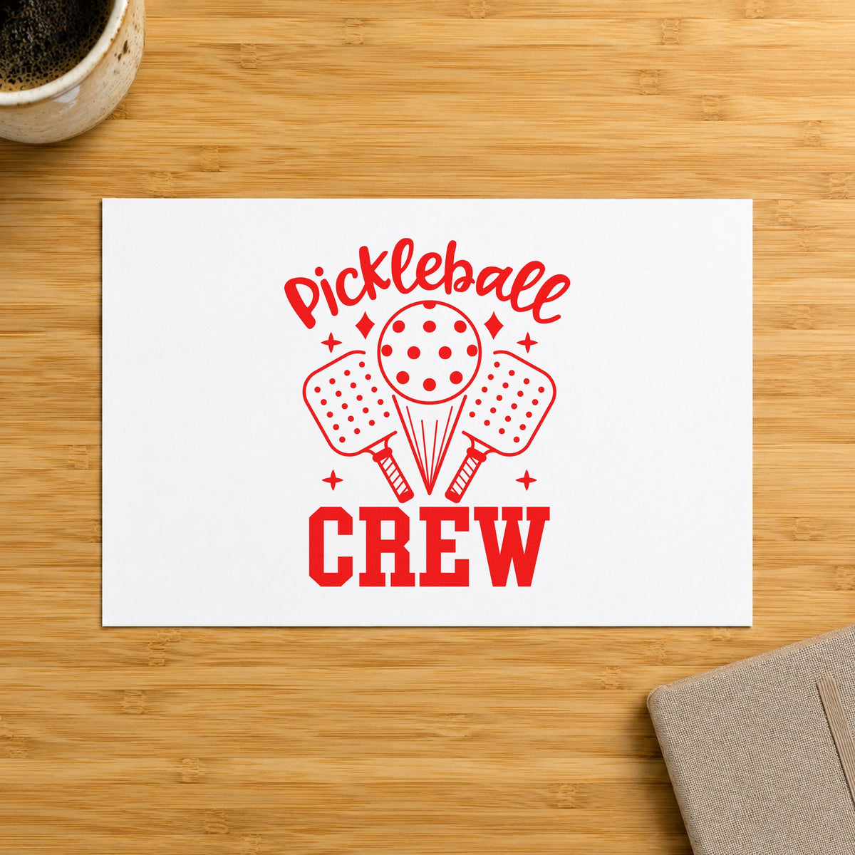 Pickleball Crew Paddles Ball craft stamp imprint in red ink on a handmade project, one idea being play plan cards.