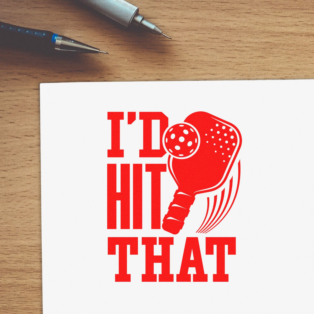 Red pickleball rubber stamp design reading It Hit That on paper, ideal for sports-themed crafts and custom stamping.