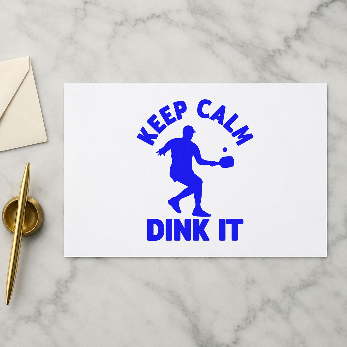 Keep Calm Dink It craft stamp in blue ink on cardstock, an easy option for warmup tee printing.
