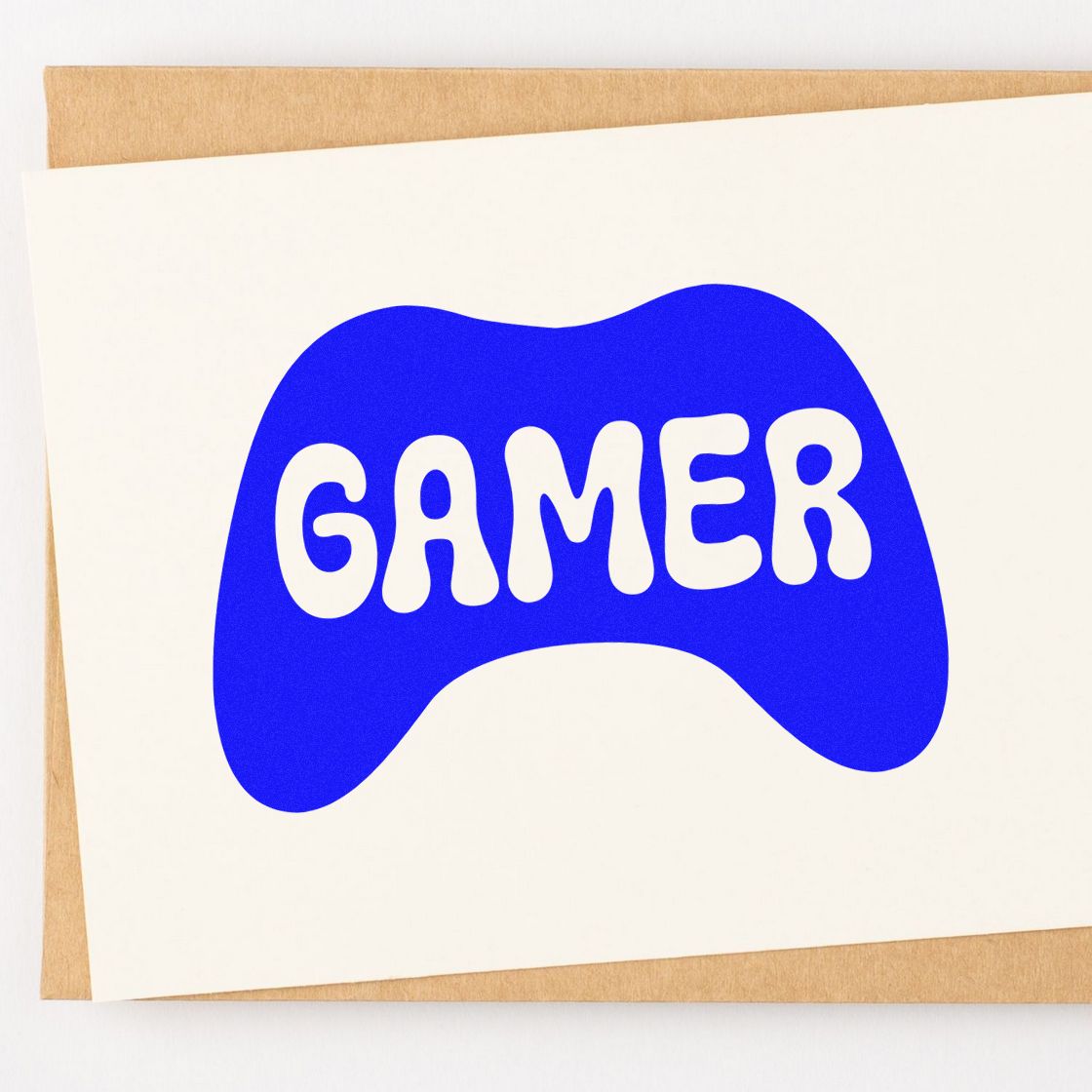 Gamer rubber stamp design featuring a blue game controller icon for gaming-themed packaging, crafts, and custom branding.