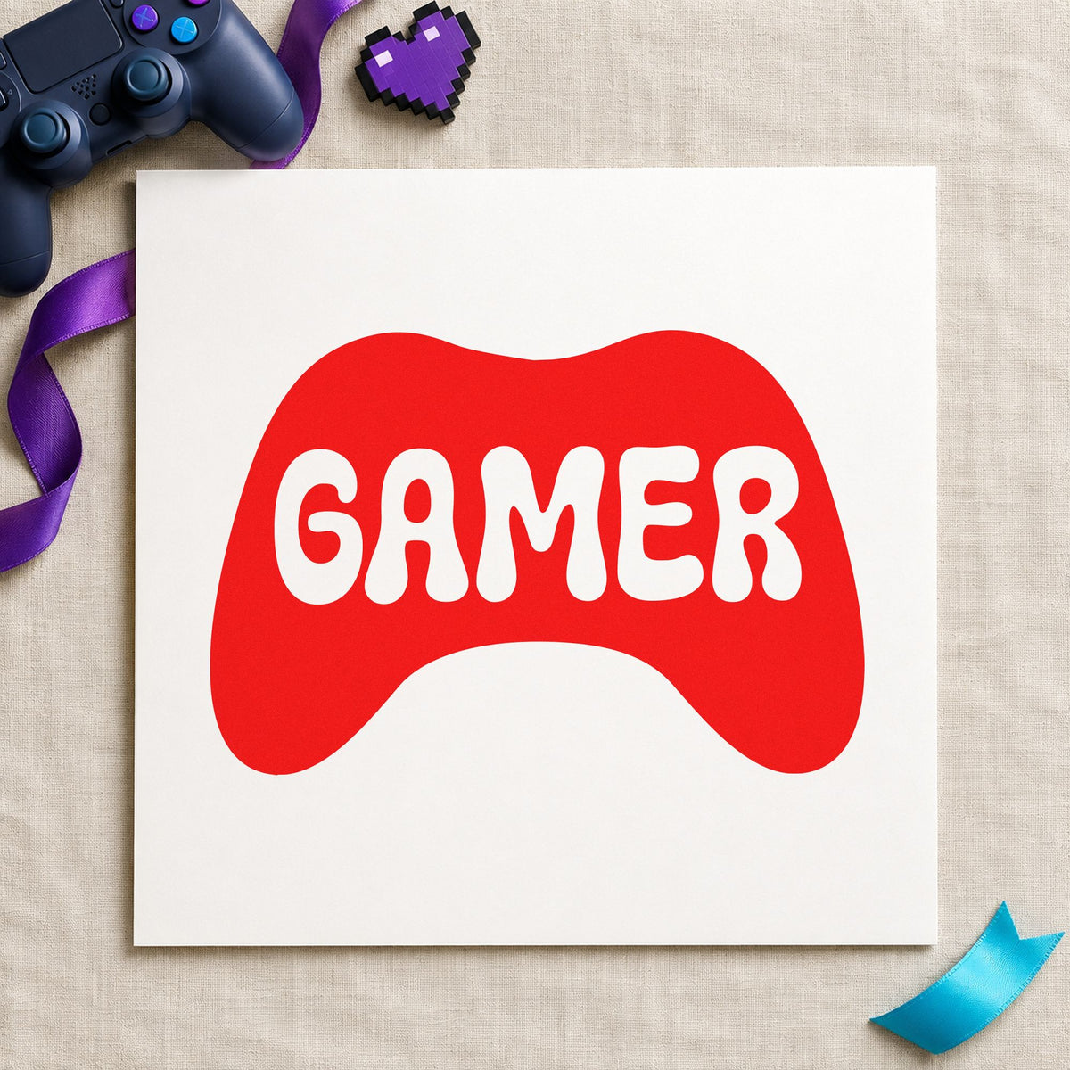 Gamer Controller Silhouette Graphic craft stamp imprint in red ink on a handmade project, one idea being build note cards.
