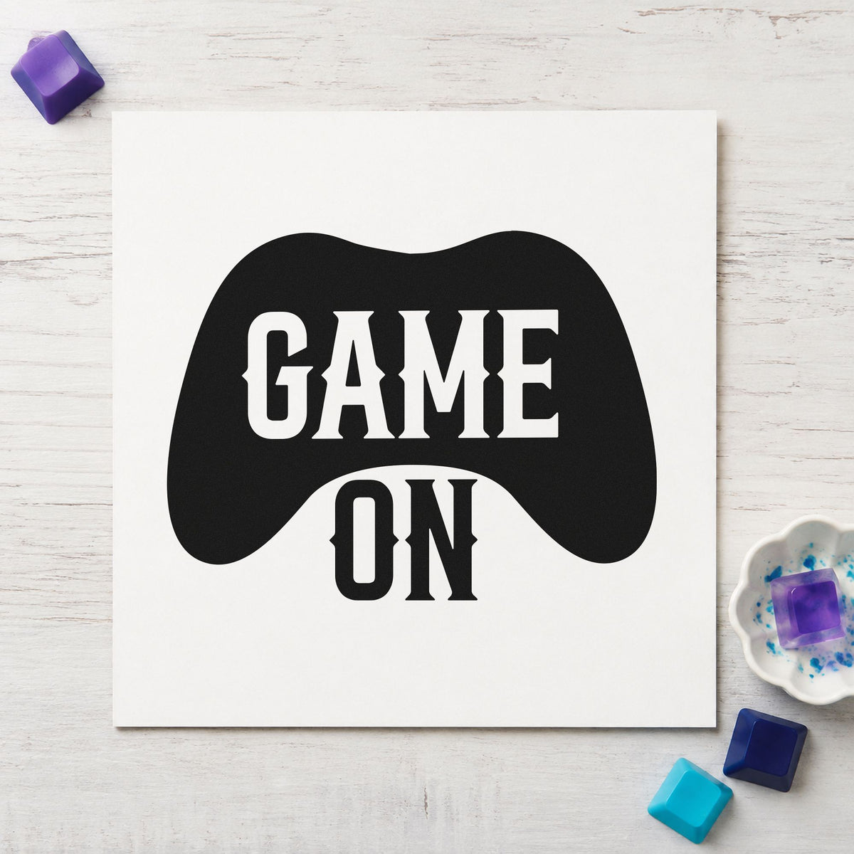 Game On Controller Silhouette craft stamp imprint in black ink on a handmade project, one idea being member kit gift tags.