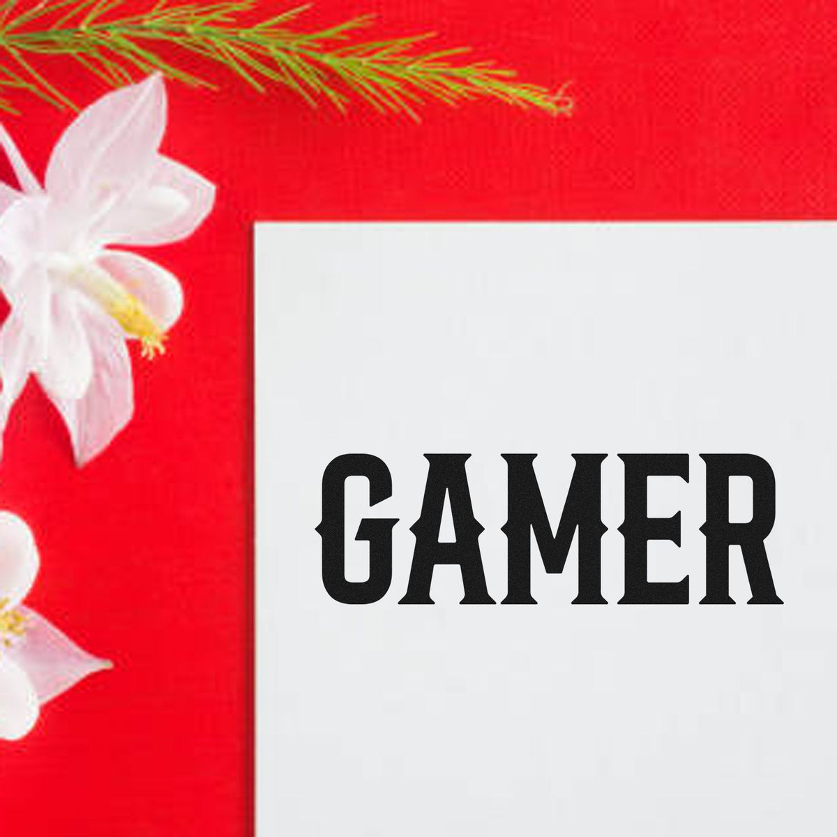 Gamer rubber stamp design with bold black lettering, ideal for gaming-themed cards, packaging, and custom craft projects.
