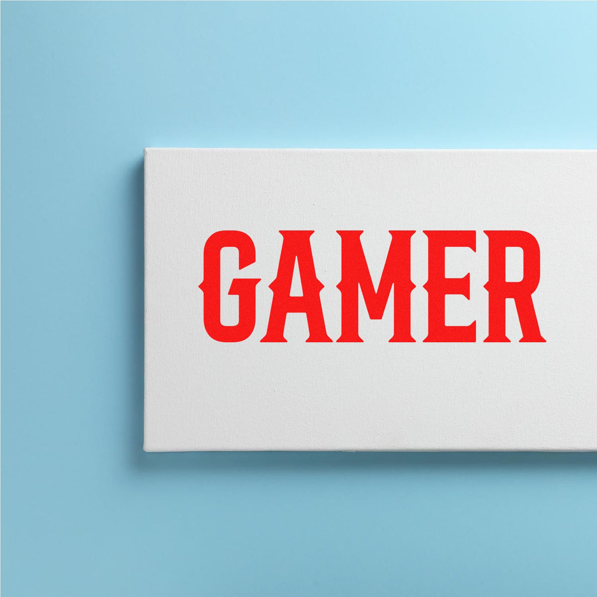 Gamer custom rubber stamp with bold red typography on a white block, ideal for gaming-themed branding and packaging.