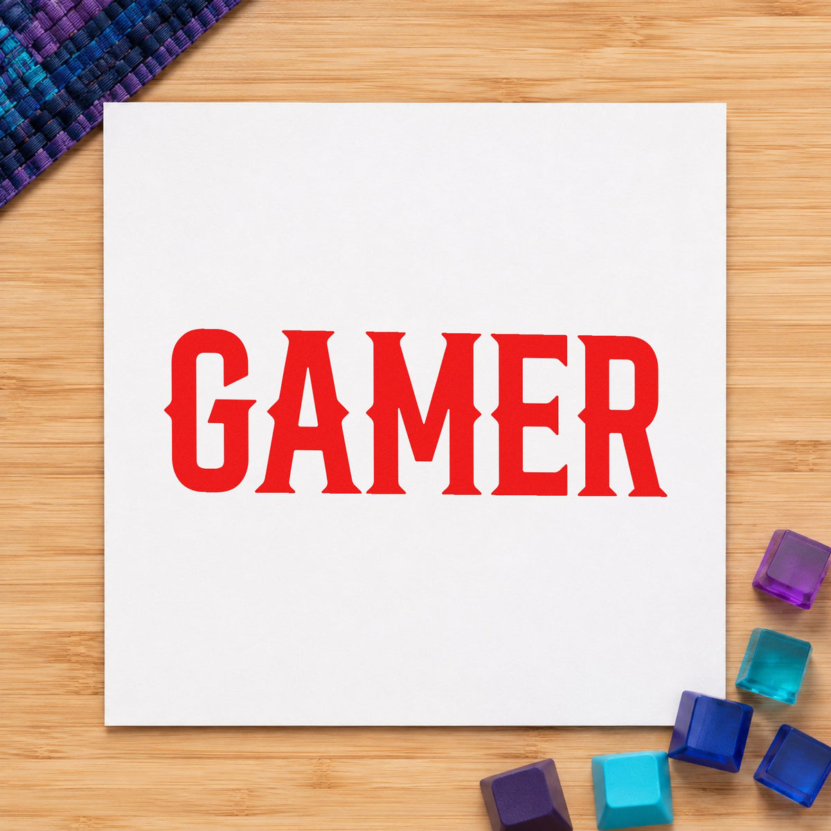 Gamer Bold Slab Lettering rubber stamp shown in red ink, stamped for projects such as rack screen labels.
