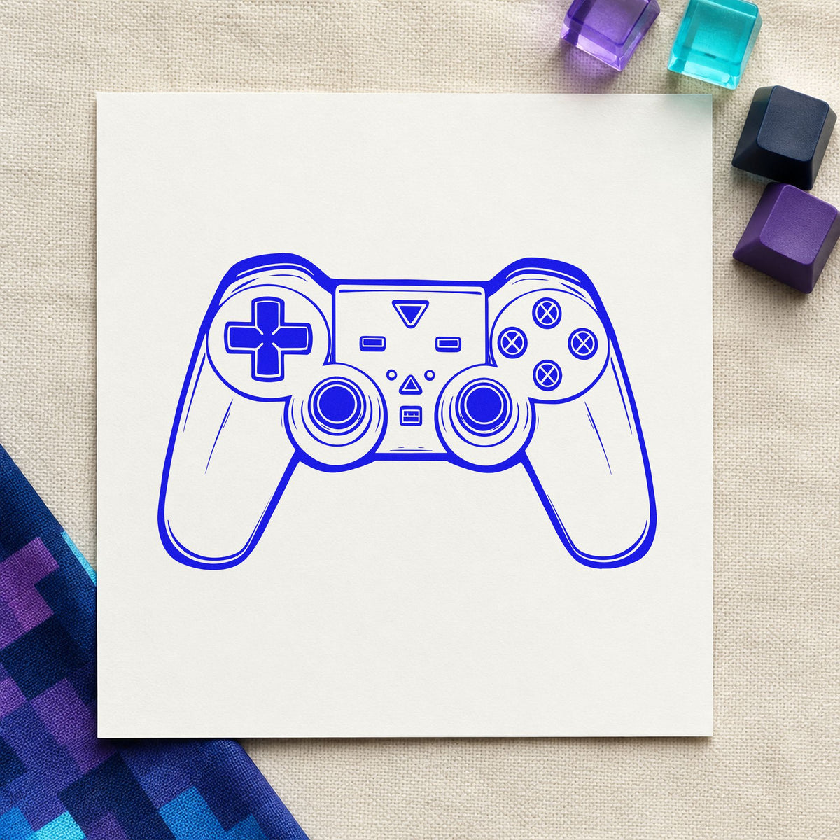 Detailed Dual Stick Controller craft stamp imprinted in blue ink on paper, a design suited to framed work bench.