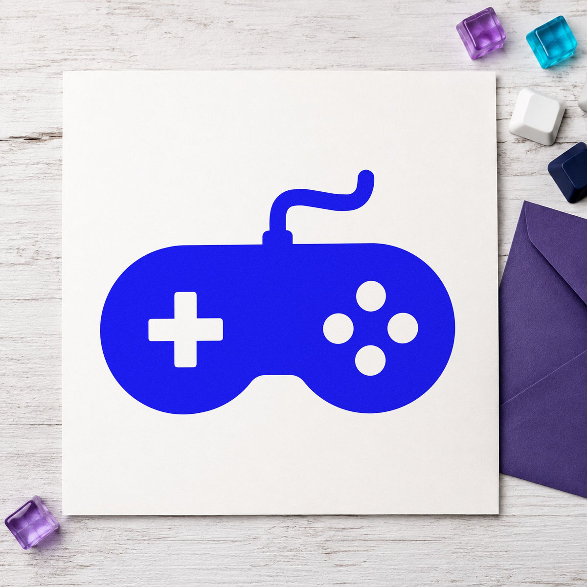 Solid Wired Retro Controller craft stamp imprinted in blue ink on paper, a design suited to framed shelf corner.